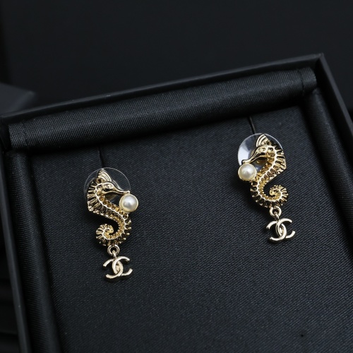 Chanel 25C Spring Seahorse Earrings, Gold-Tone Finish with White Pearl Accents 1 Chanel 25C Spring Seahorse Earrings, Gold-Tone Finish with White Pearl Accents