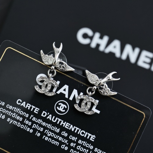 Chanel Silver Double C Swallow Drop Earrings - Chic & Trendy 1 Chanel Silver Double C Swallow Drop Earrings - Chic & Trendy