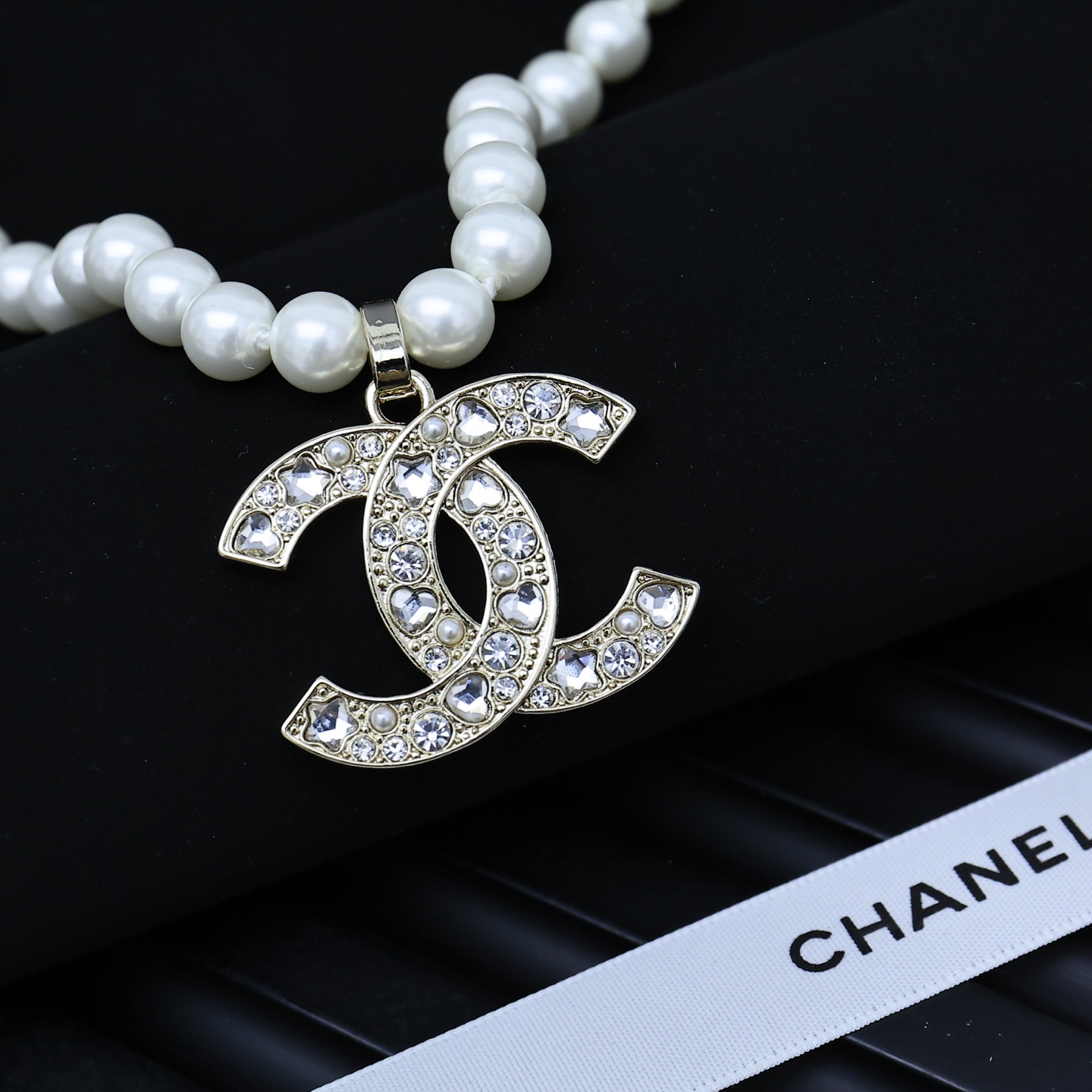  Chanel25。爆款浅金色星星+爱心大双C字母
珍珠项链110055