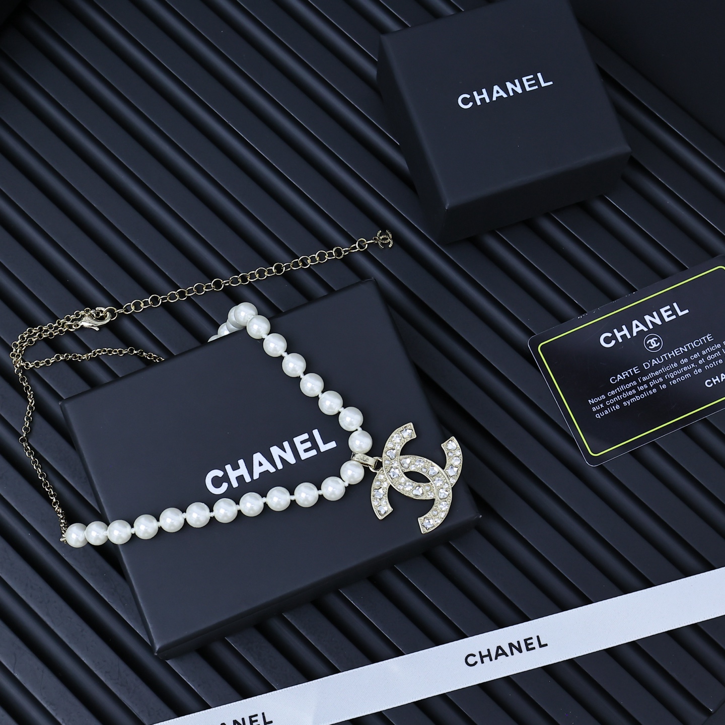  Chanel25。爆款浅金色星星+爱心大双C字母
珍珠项链110055