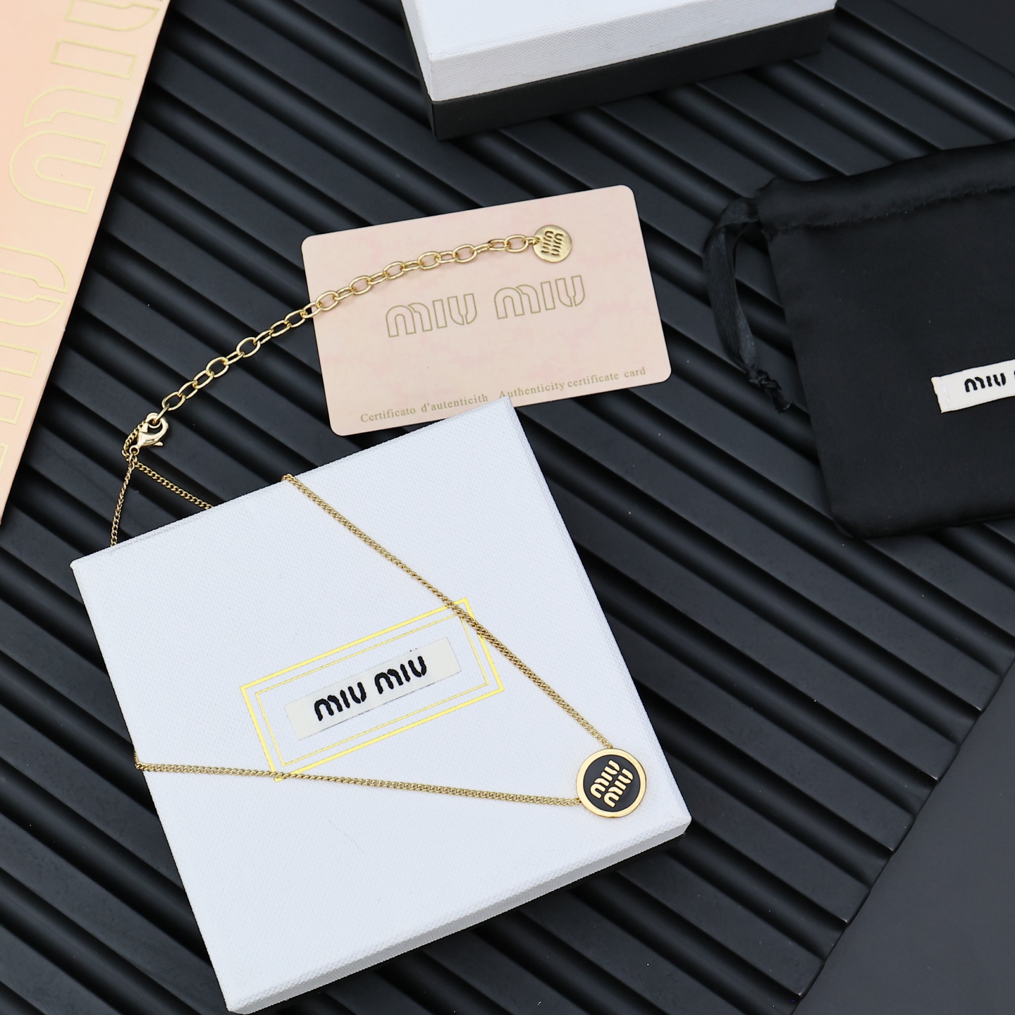 Miu Miu Candy Button Necklace: Super-Simplistic Logo Design with Beauty in Detail