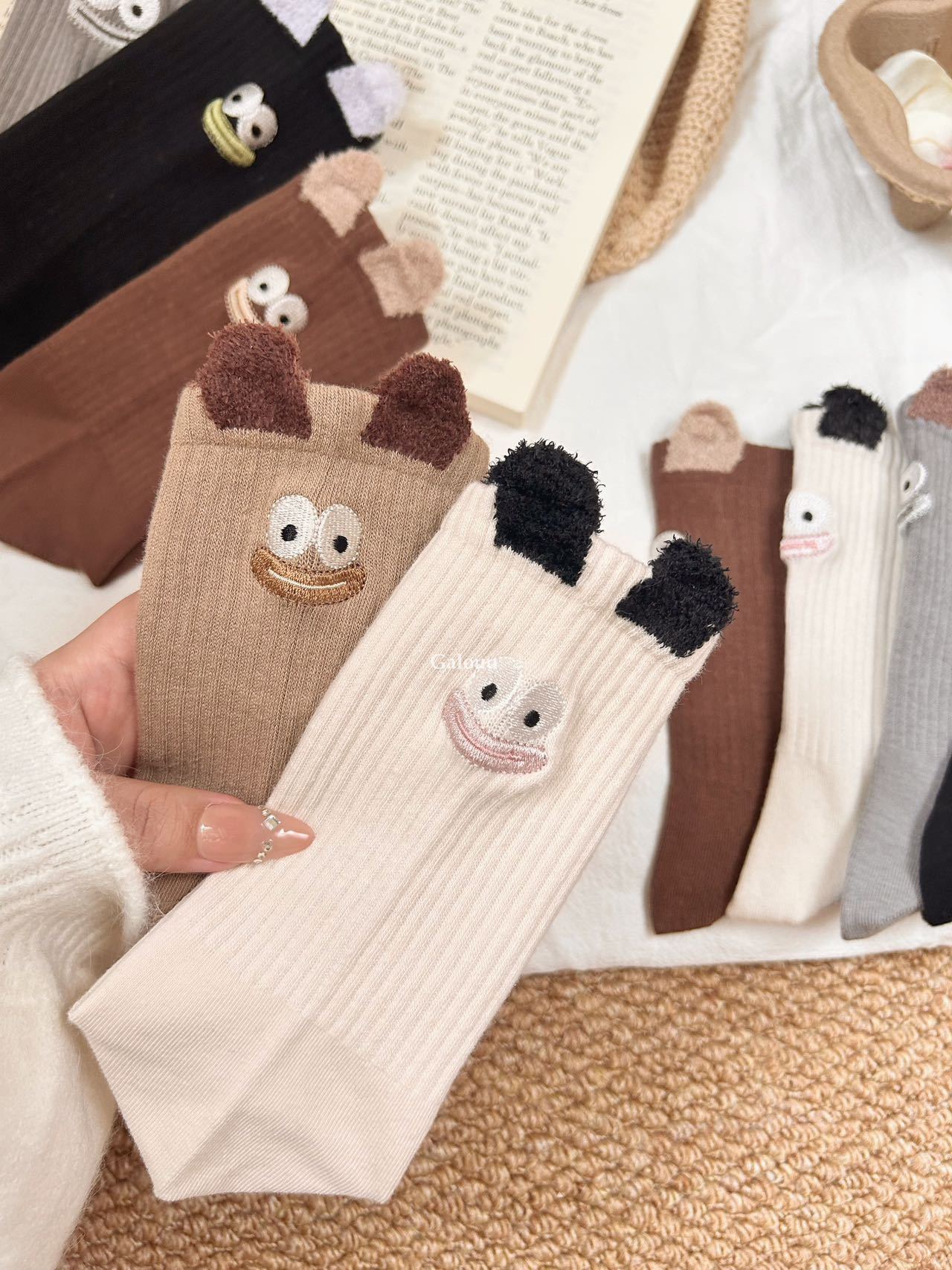 Detail View: Novelty socks featuring an embroidered expression motif at - Comprehensive 3