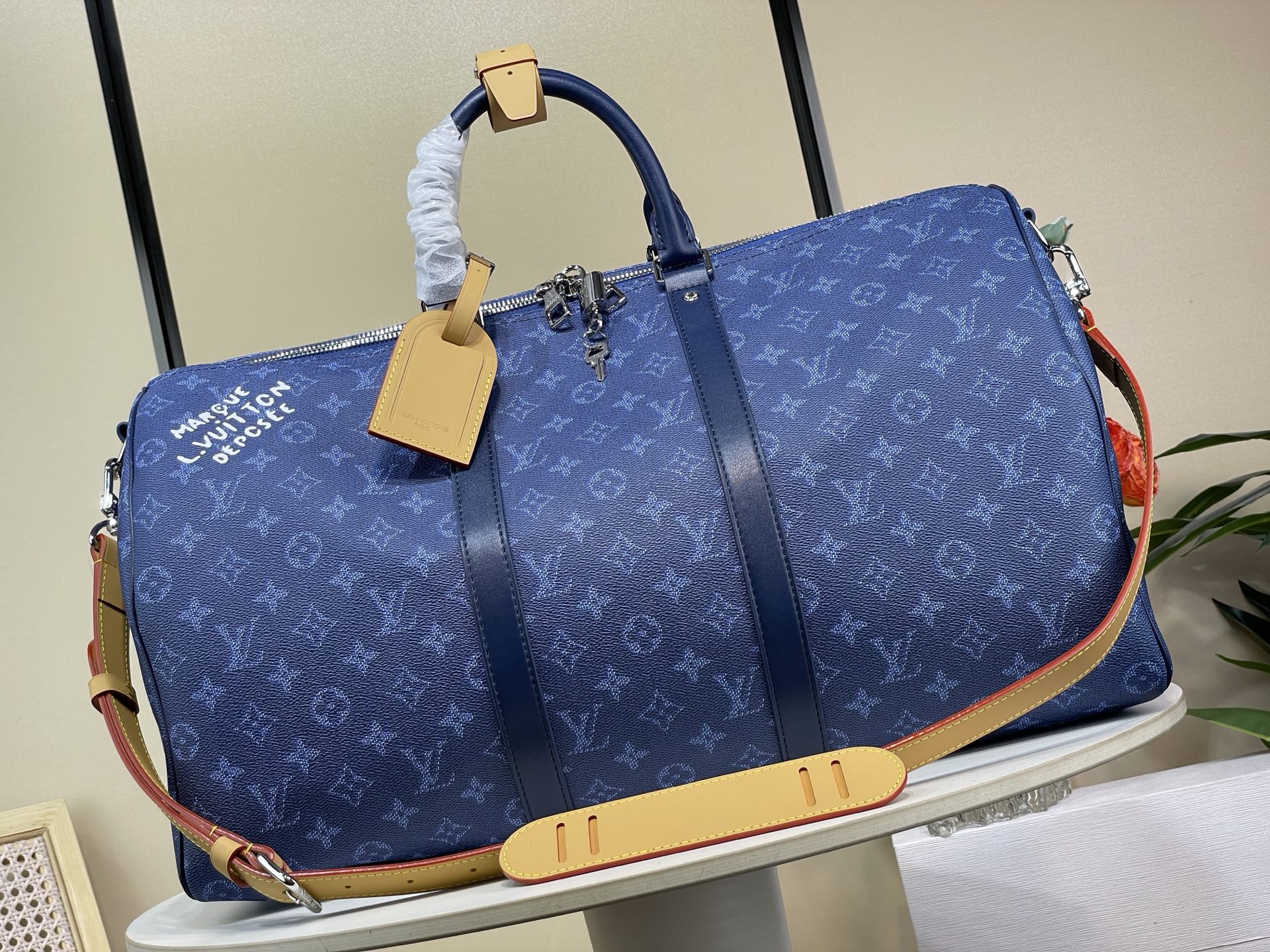 Louis Vuitton Keepall Bandouliere 50 Blue Monogram Heritage Travel Bag