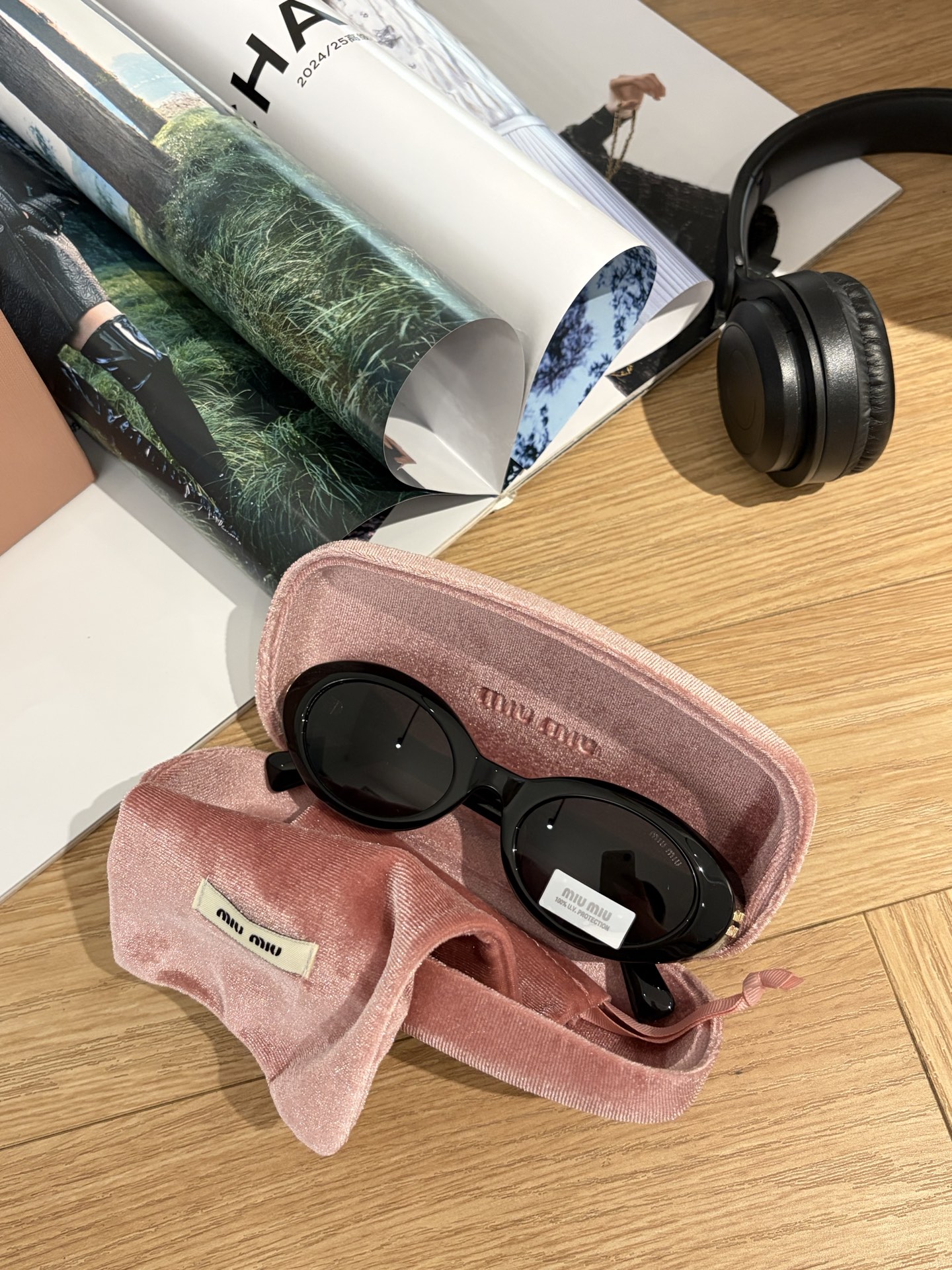 MIUMIU Sunglasses Acetate Oval Black