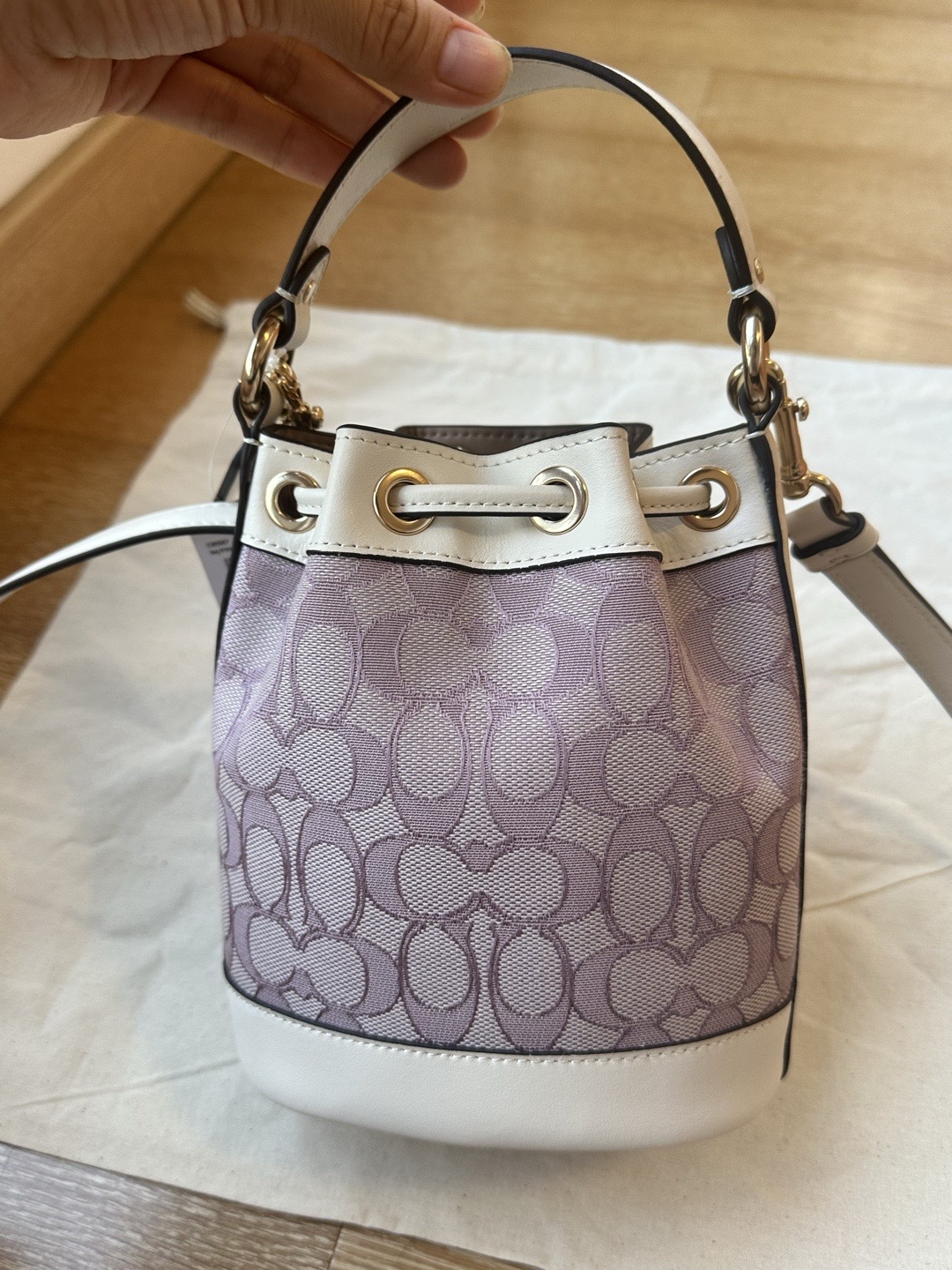 Coach ～原Coach蔻驰 CBS67 迷你mini Dempsey系列水桶包 提花织物配牛皮材质