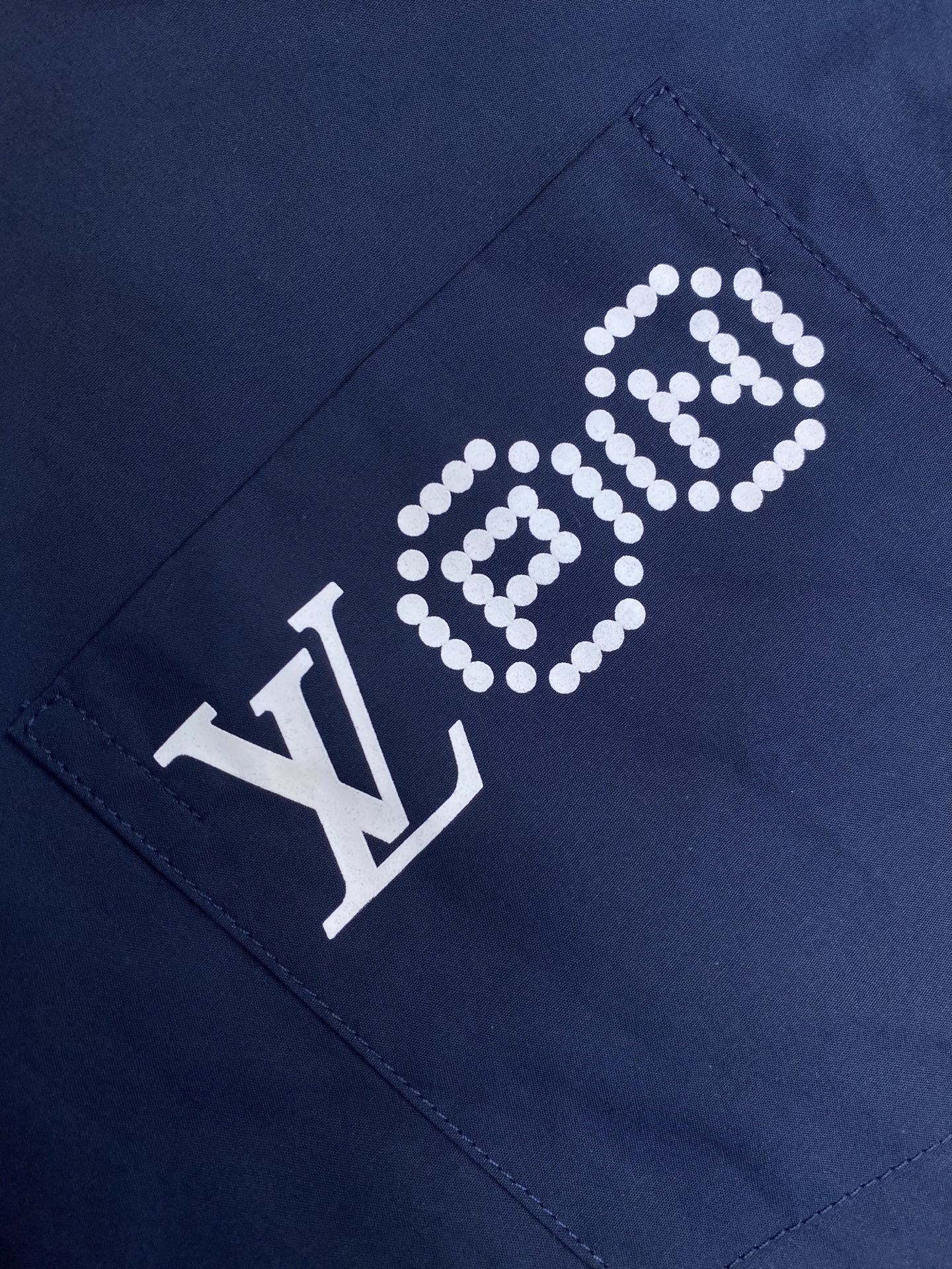 “Nigo Co-Signed Blue Long Sleeve Shirt: Pharrell Collaboration 2025 Collection Review” - 图片 5