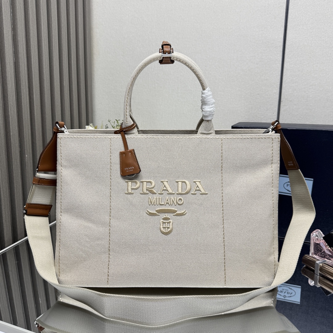 Prada Canvas Tote Bag - Versatile Design, Spacious Interior, and Leather Trim