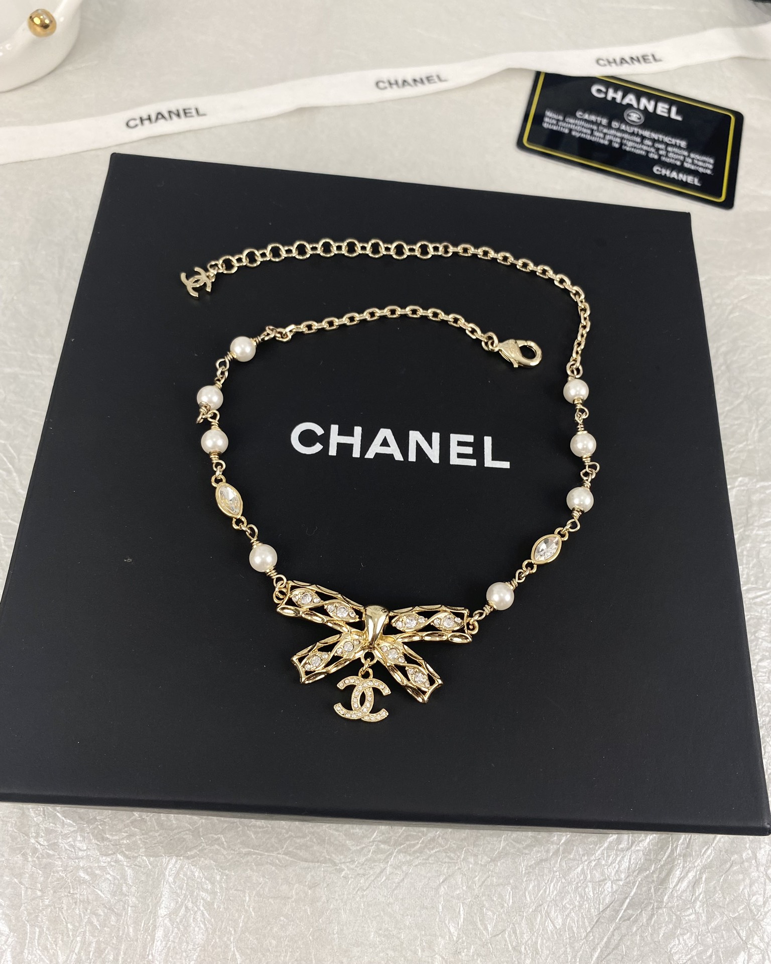 NO:101955,Xiaoxiang new bow pendant diamond pearl necklace, Chanel necklace, chanel, necklace19860909小香新款蝴蝶结吊坠镶钻珍珠项链,香奈儿项链,chanel,necklace,Jewelry
