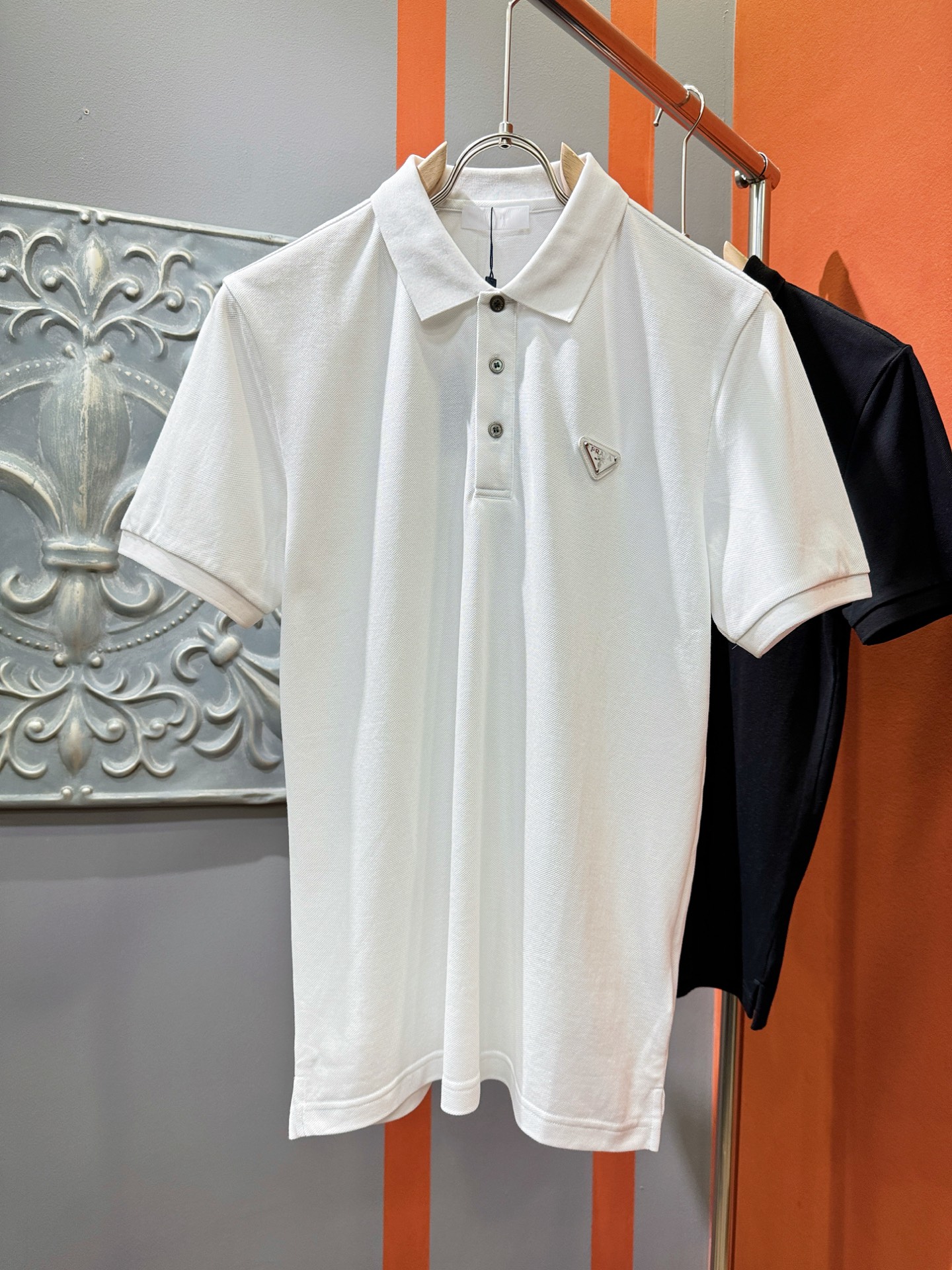 PRADA 普拉达 2025官方春夏新款 男士翻领短袖POLO衫，胸口精...