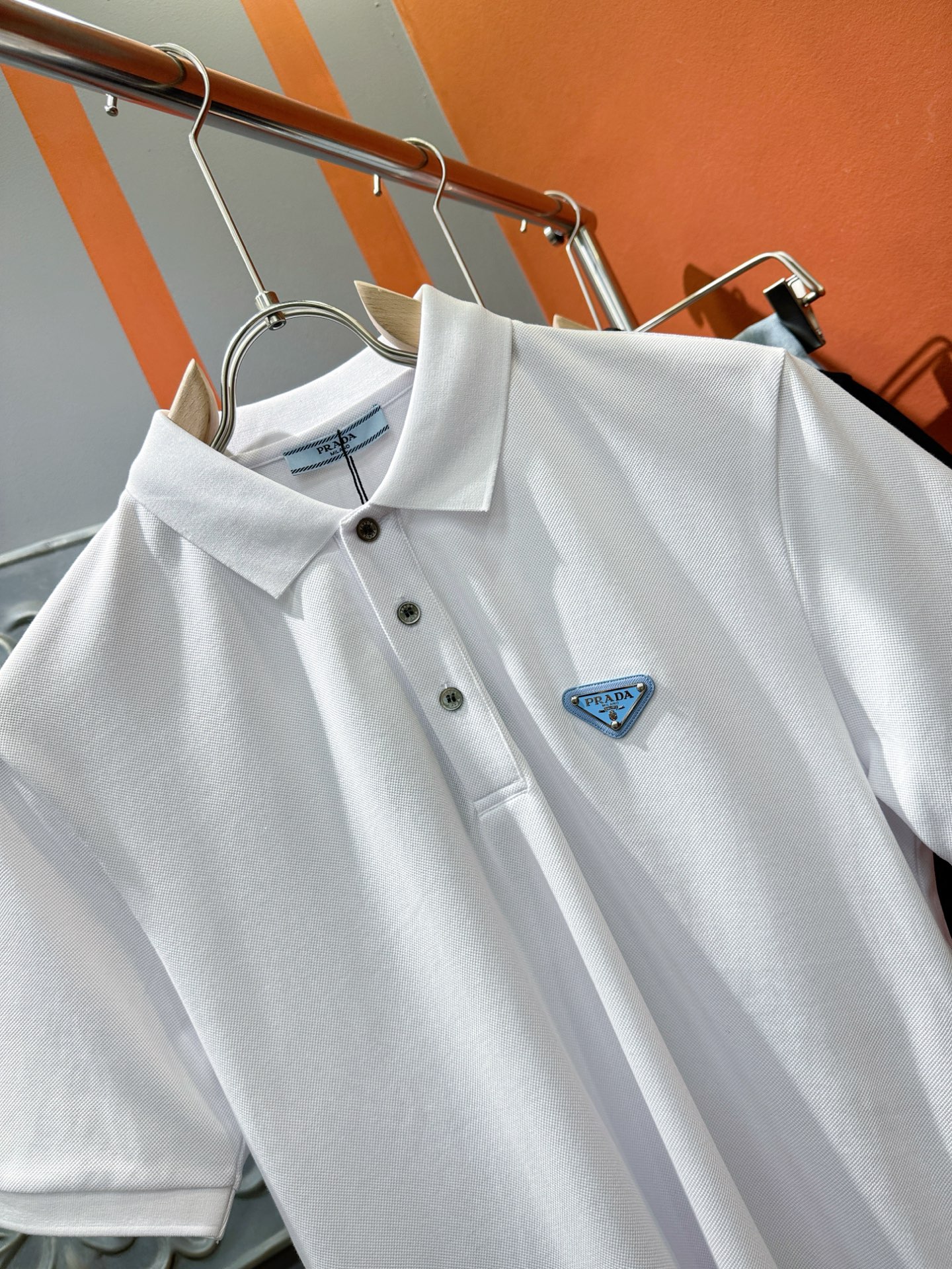  PRADA 普拉达 2025官方春夏新款 男士翻领短袖POLO衫，胸口精致Logo，高端主线系列，进口