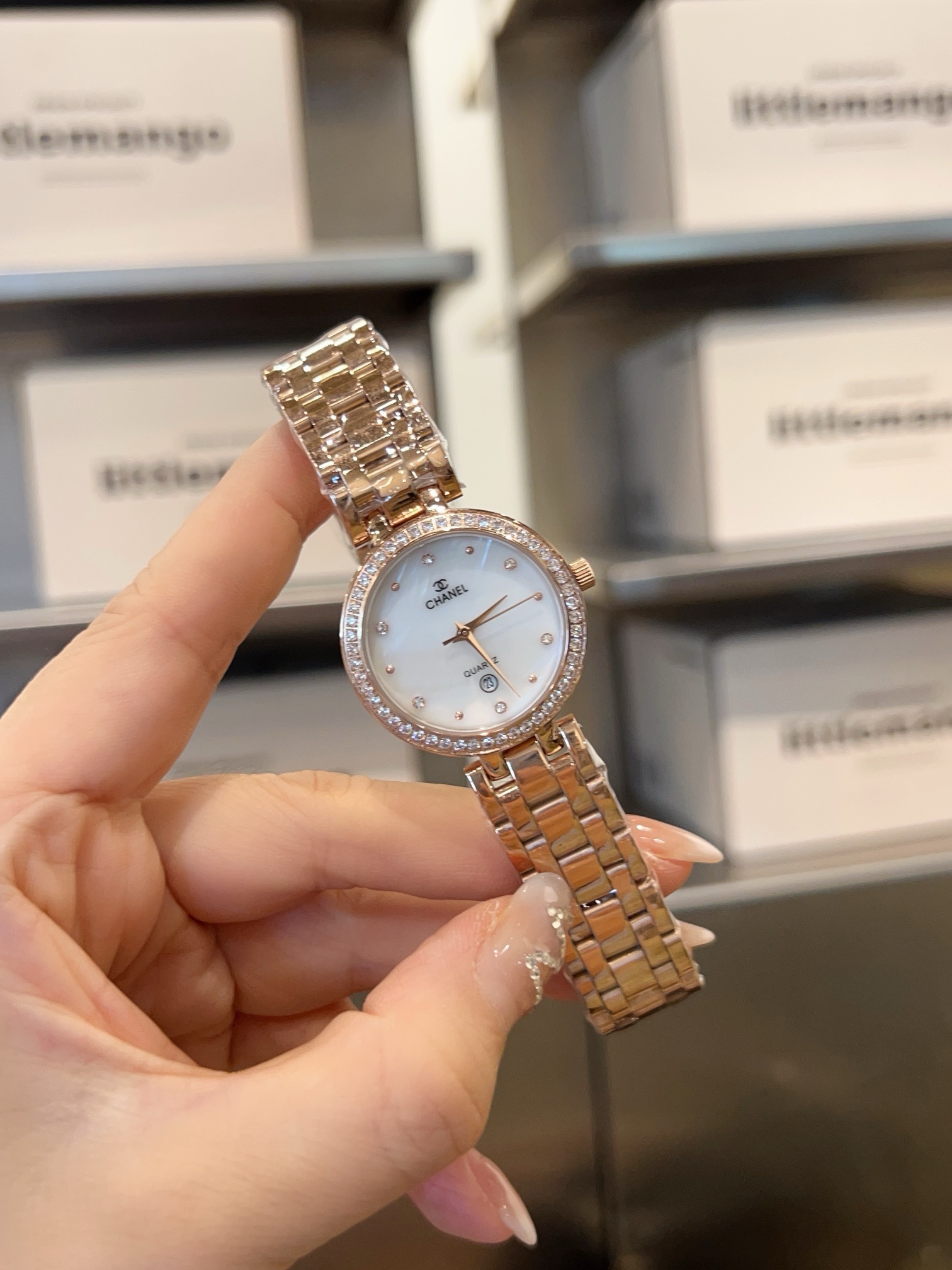Chanel J12 rose gold-tone or silver-tone case and bracelet, diamond bezel, white dial 28mm Women's Quartz