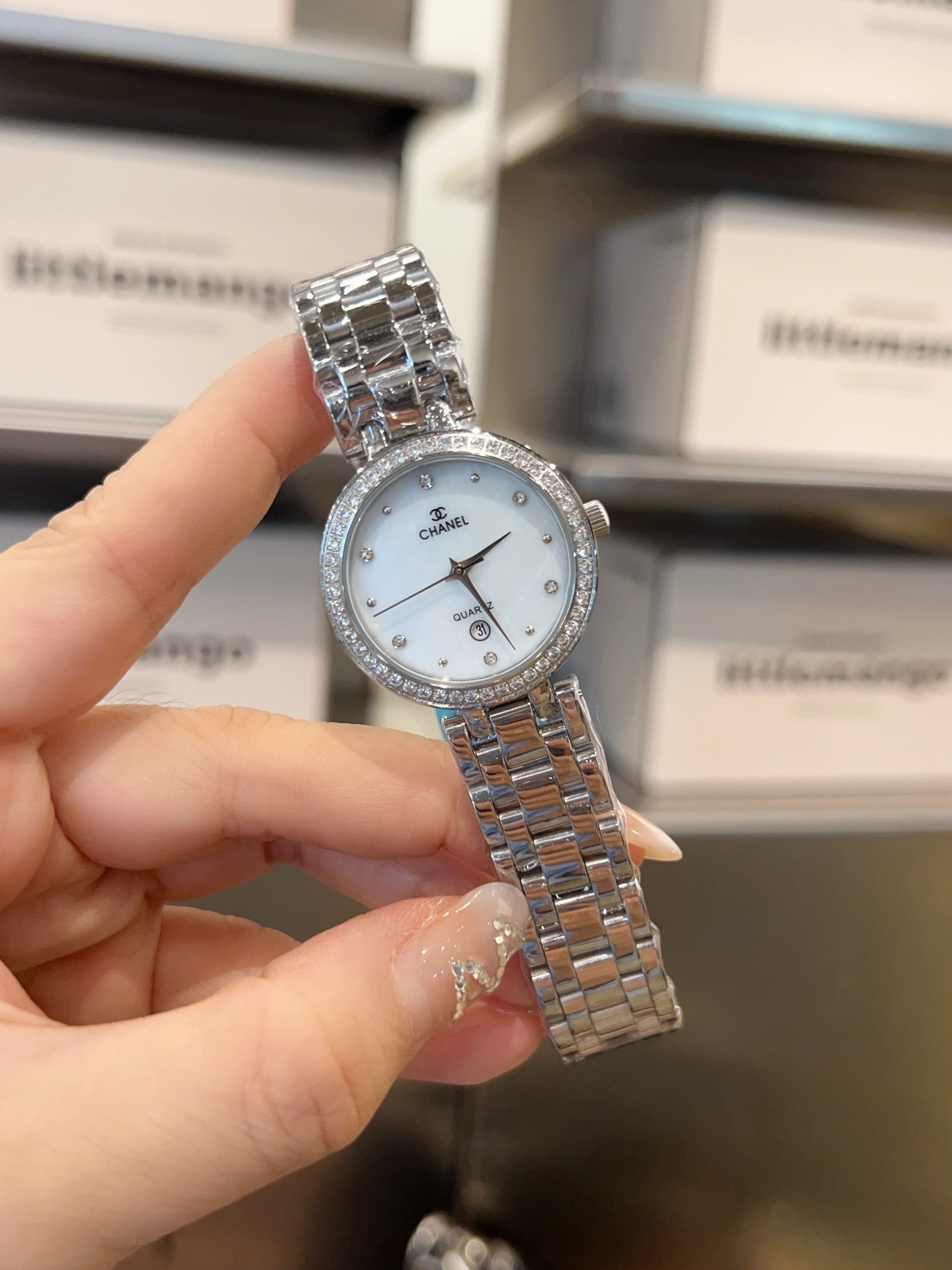 Chanel J12 rose gold-tone or silver-tone case and bracelet, diamond bezel, white dial 28mm Women's Quartz