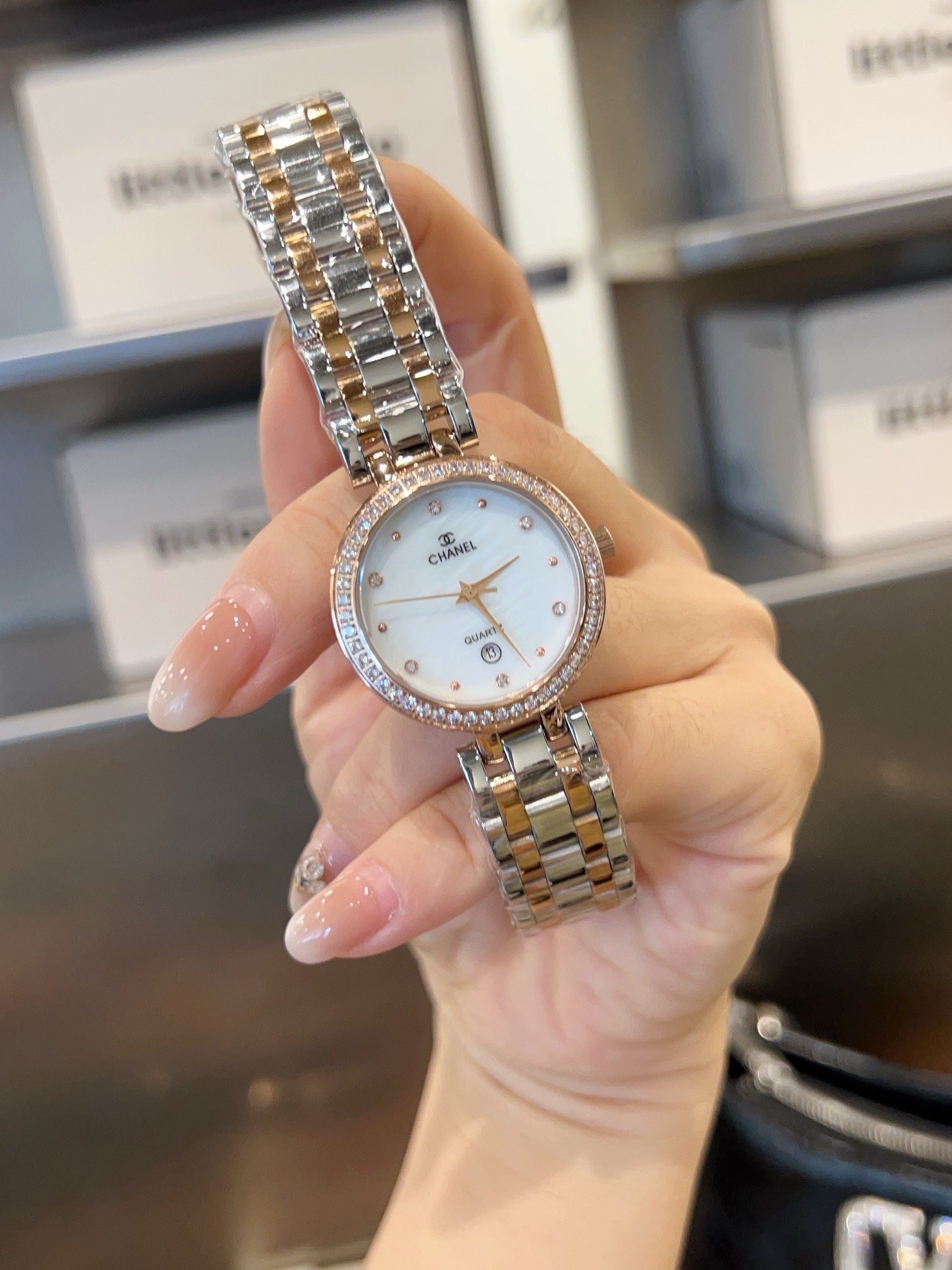 Chanel J12 rose gold-tone or silver-tone case and bracelet, diamond bezel, white dial 28mm Women's Quartz