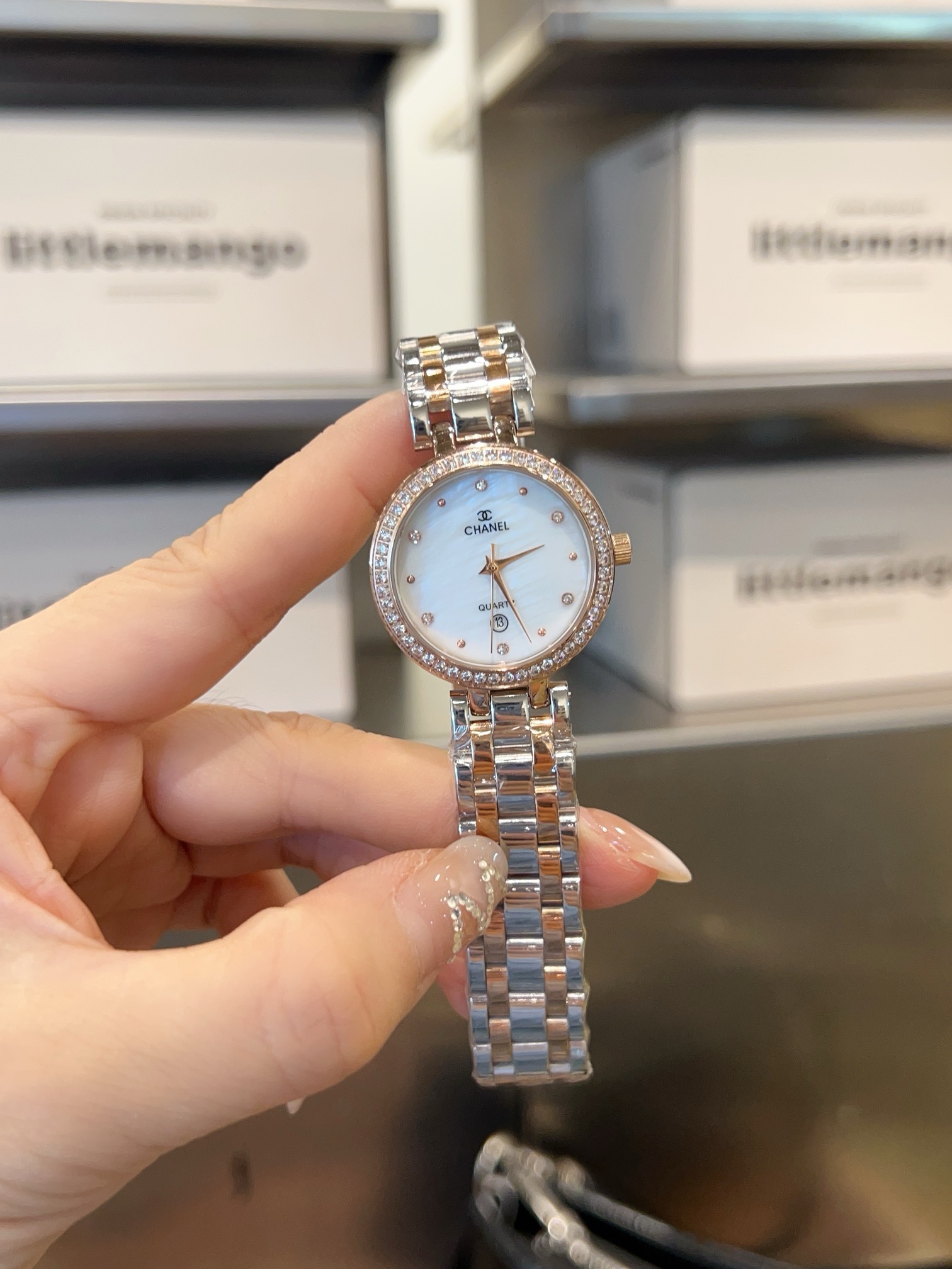 Chanel J12 rose gold-tone or silver-tone case and bracelet, diamond bezel, white dial 28mm Women's Quartz
