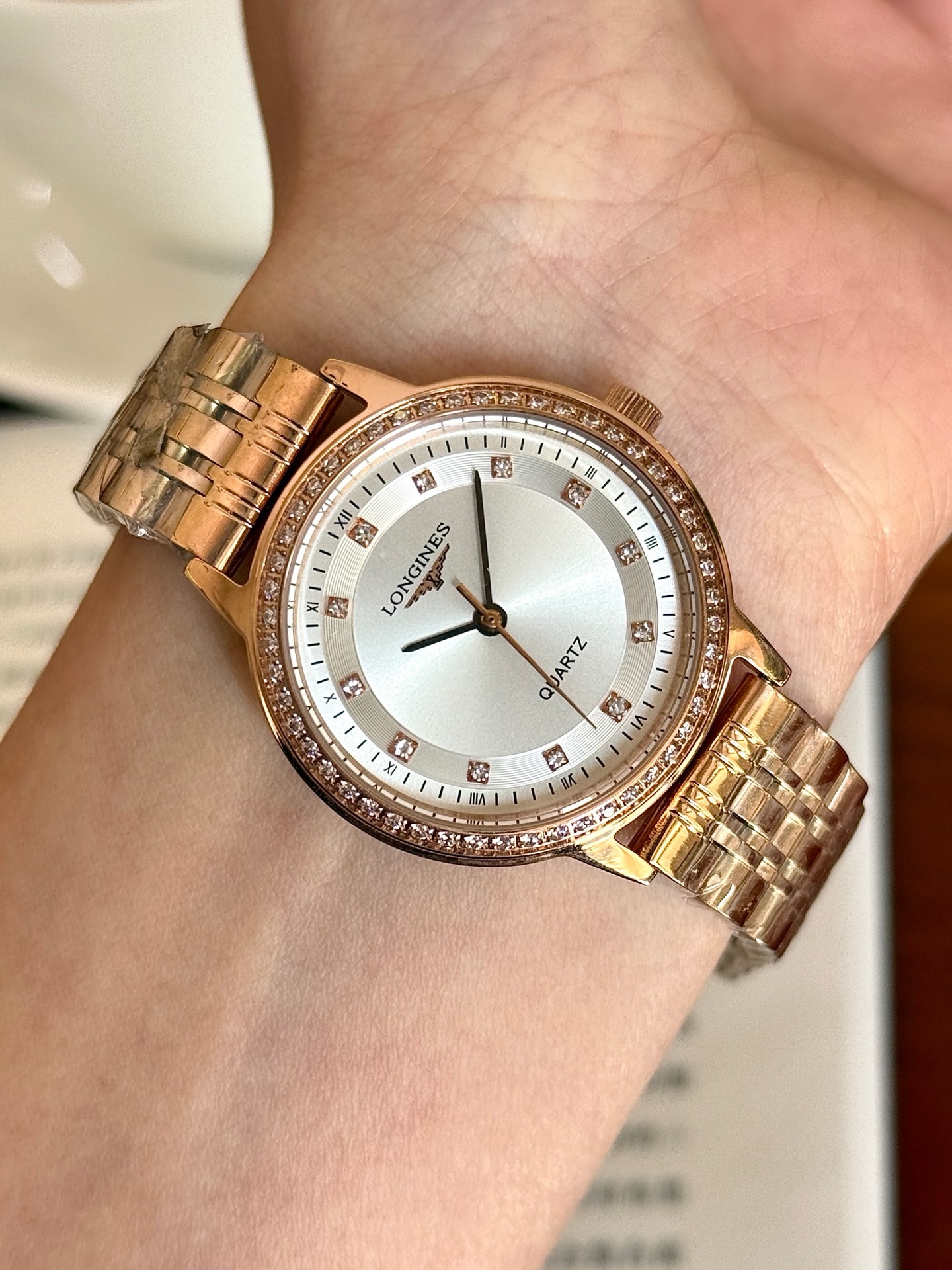 Longines La Grande Classique de Longines rose gold-tone case and bracelet, diamond bezel, silver dial 28mm Women's Quartz