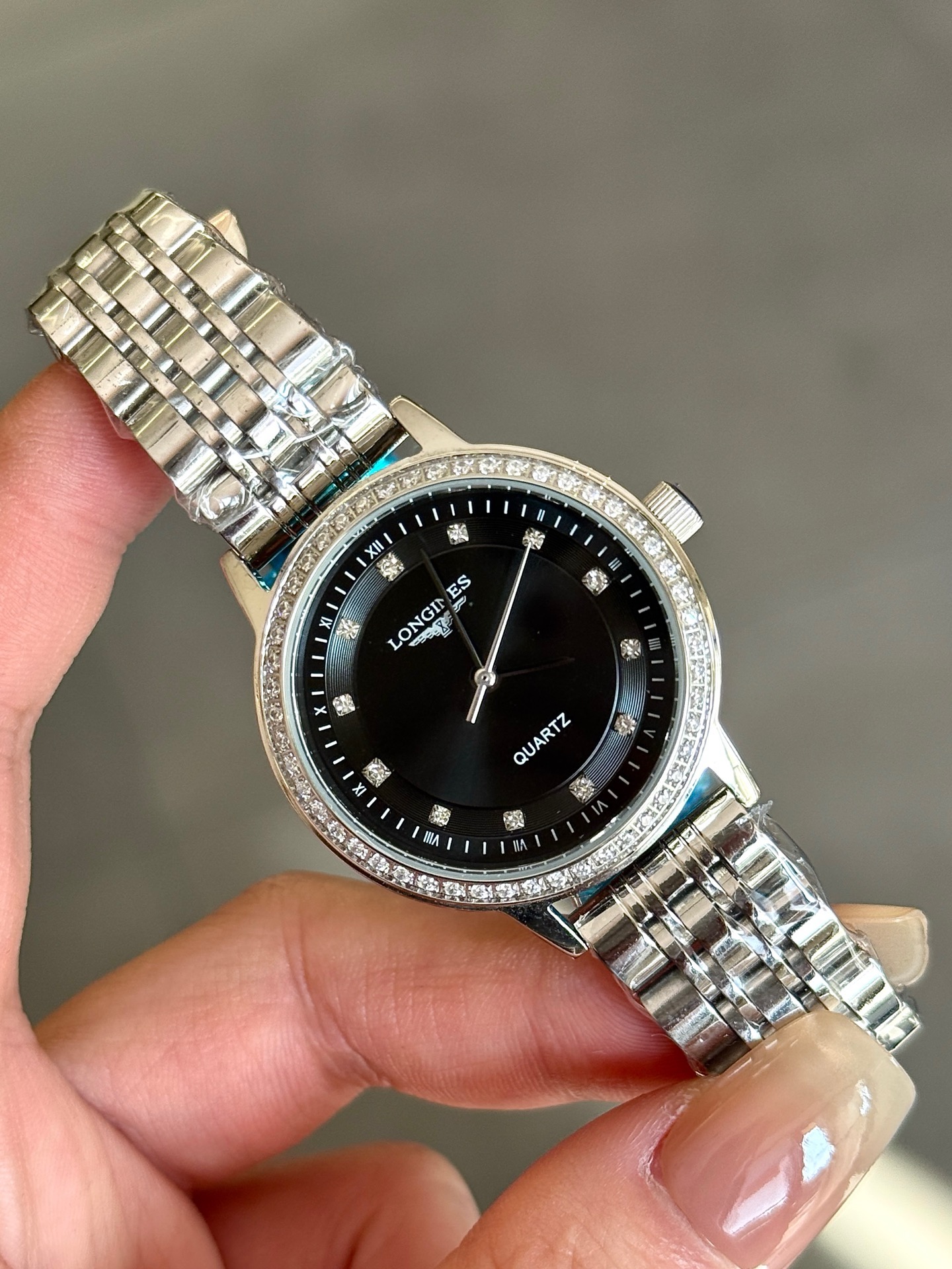 Longines La Grande Classique de Longines rose gold-tone case and bracelet, diamond bezel, silver dial 28mm Women's Quartz