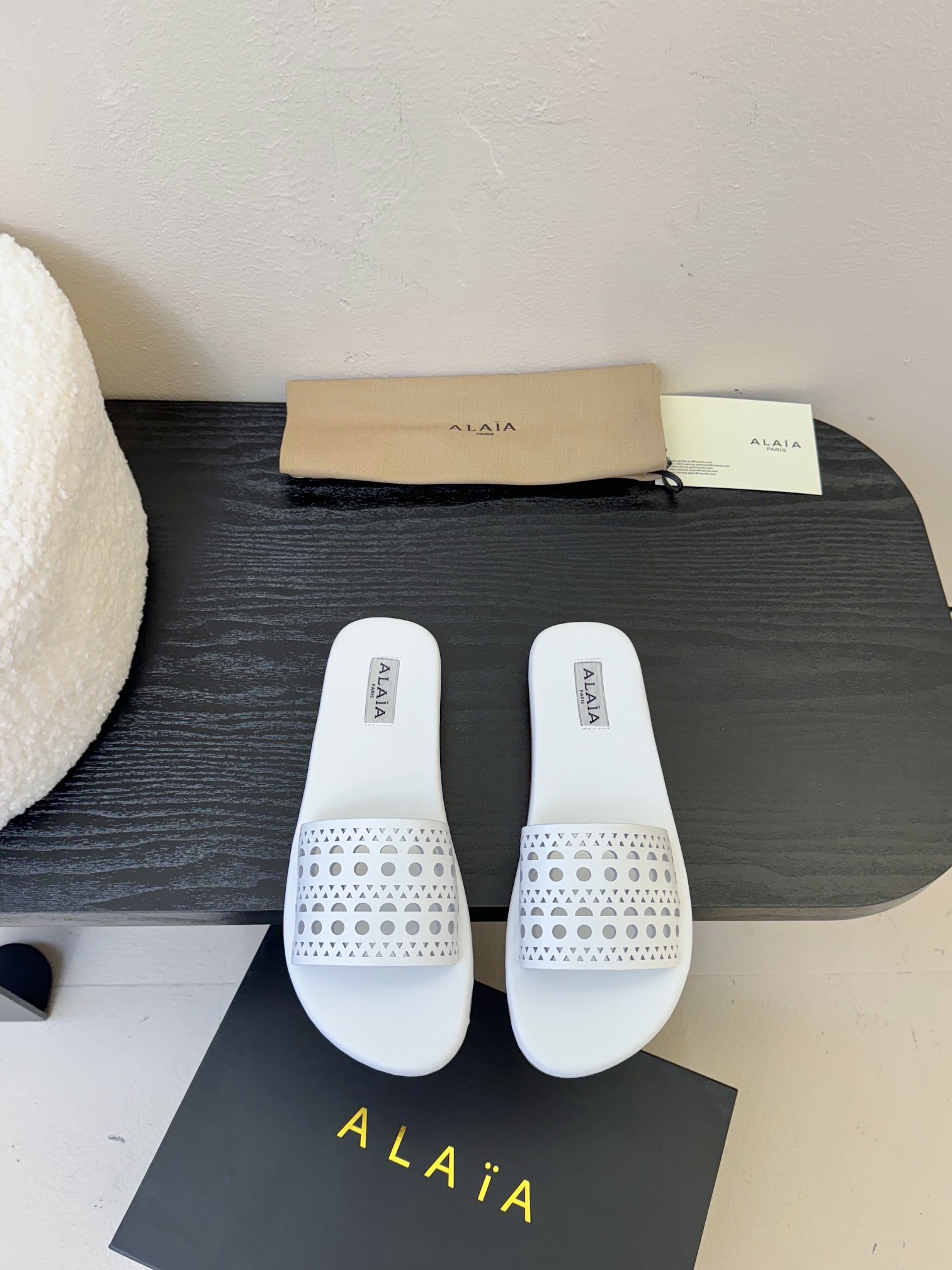 ALAIA White Leather Flat Sandals Women's Designer Slip-Ons,Comfortable & Stylish