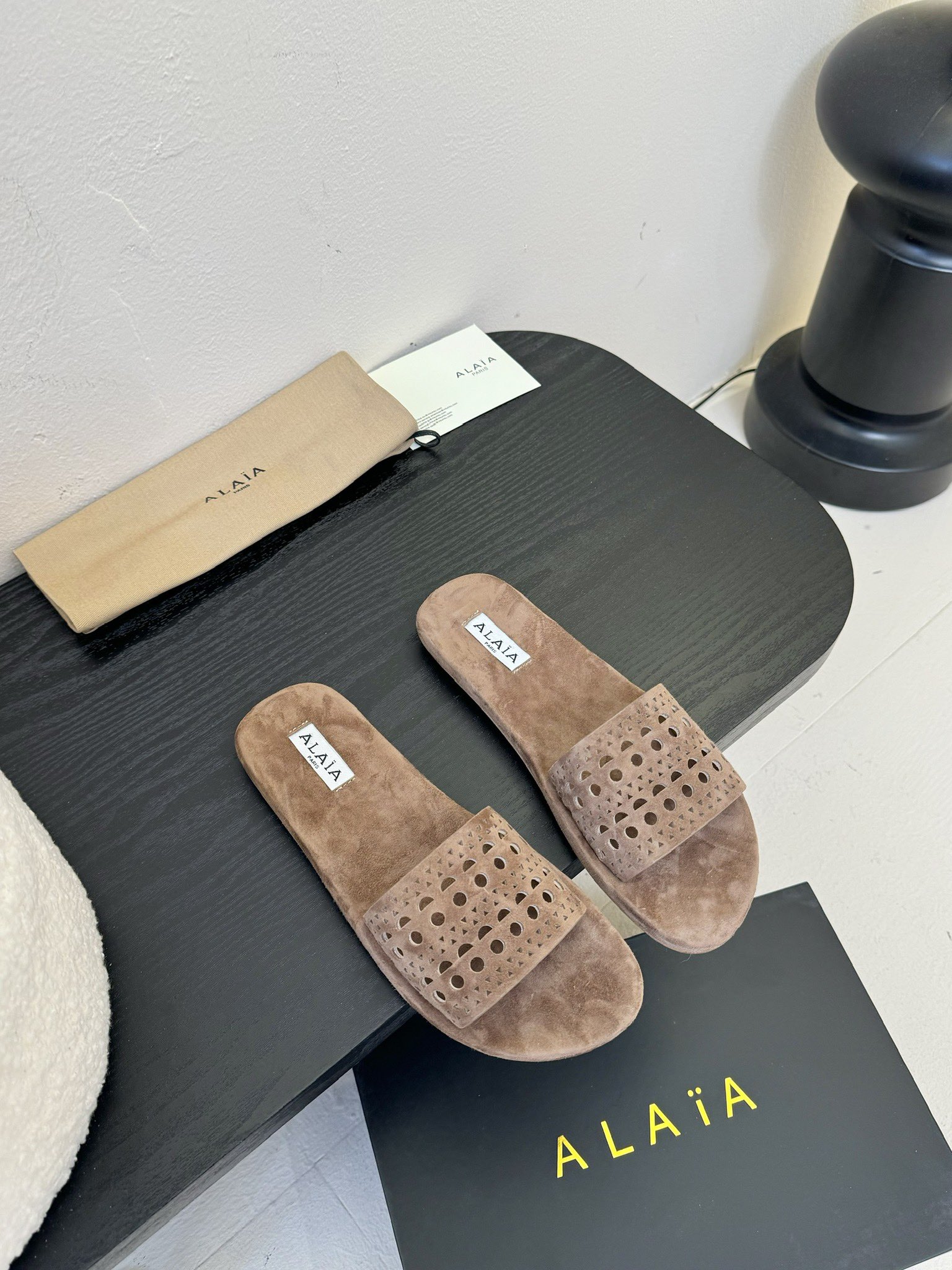 Alaïa New Hollow-Out Flat Sandals, Ultra-Soft, Comfortable, and Versatile