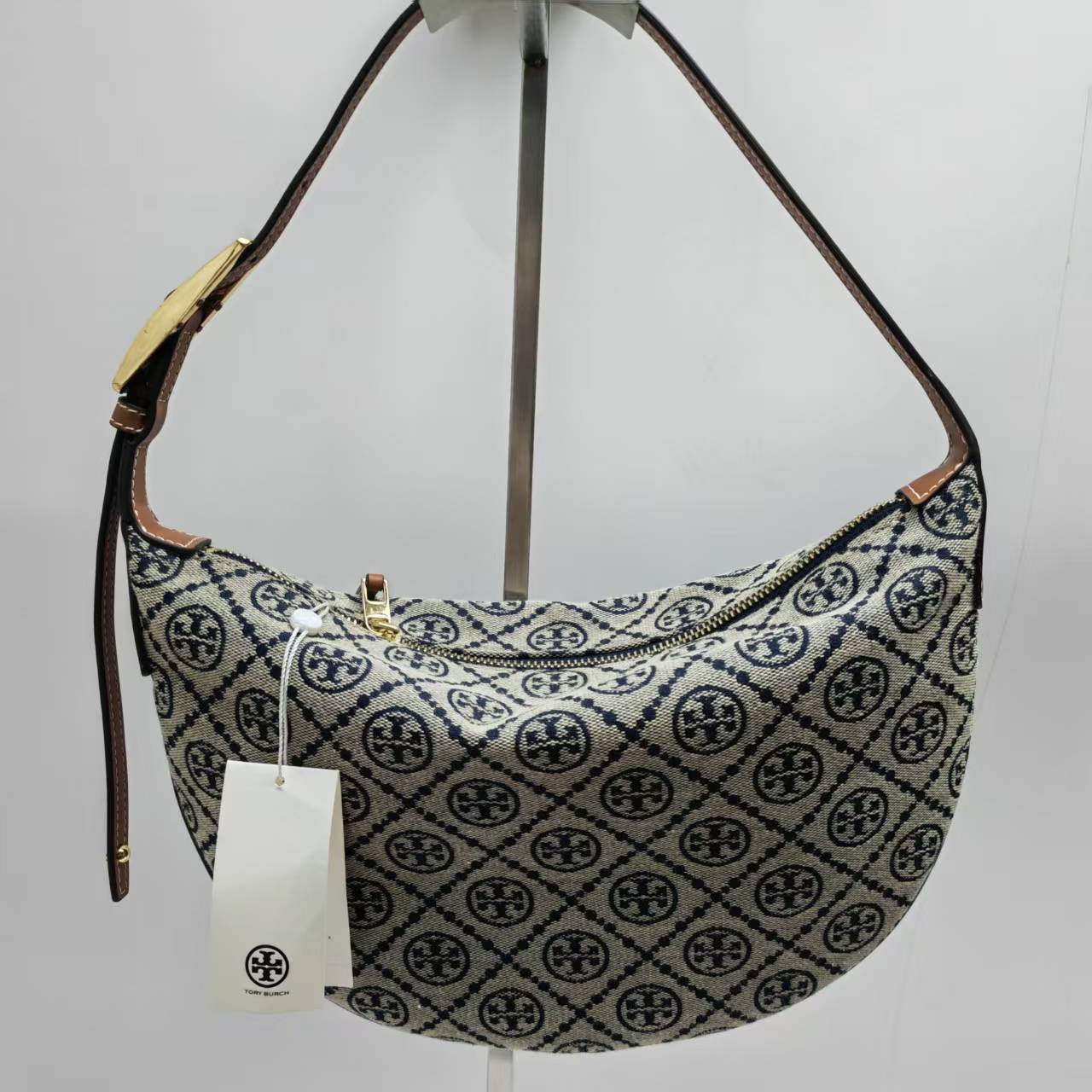 Tory Burch ToryBurch全新老花新月包 单肩腋下包 独具2025春夏秀场风格 柔和圆润