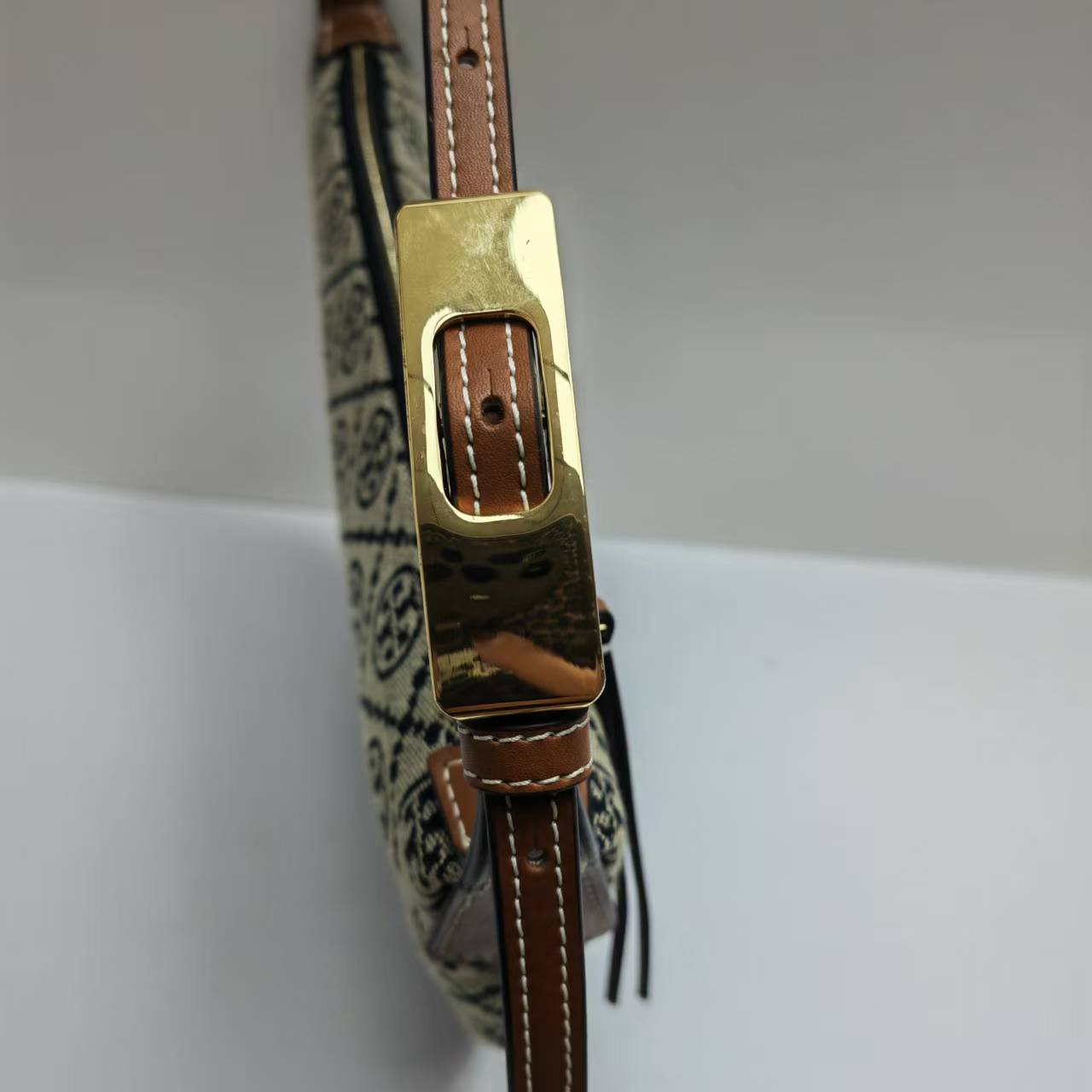 Tory Burch ToryBurch全新老花新月包 单肩腋下包 独具2025春夏秀场风格 柔和圆润