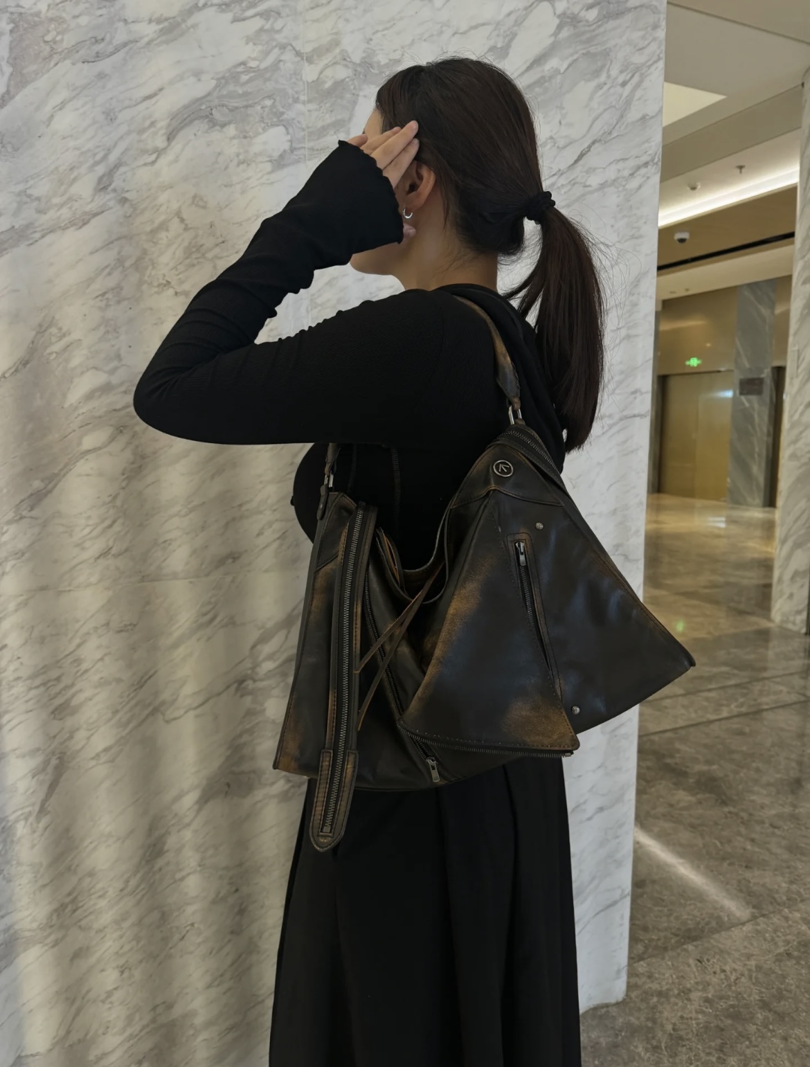 GROTTO, the contemporary designer label, presents its signature Hobo bag - Comprehensive 2