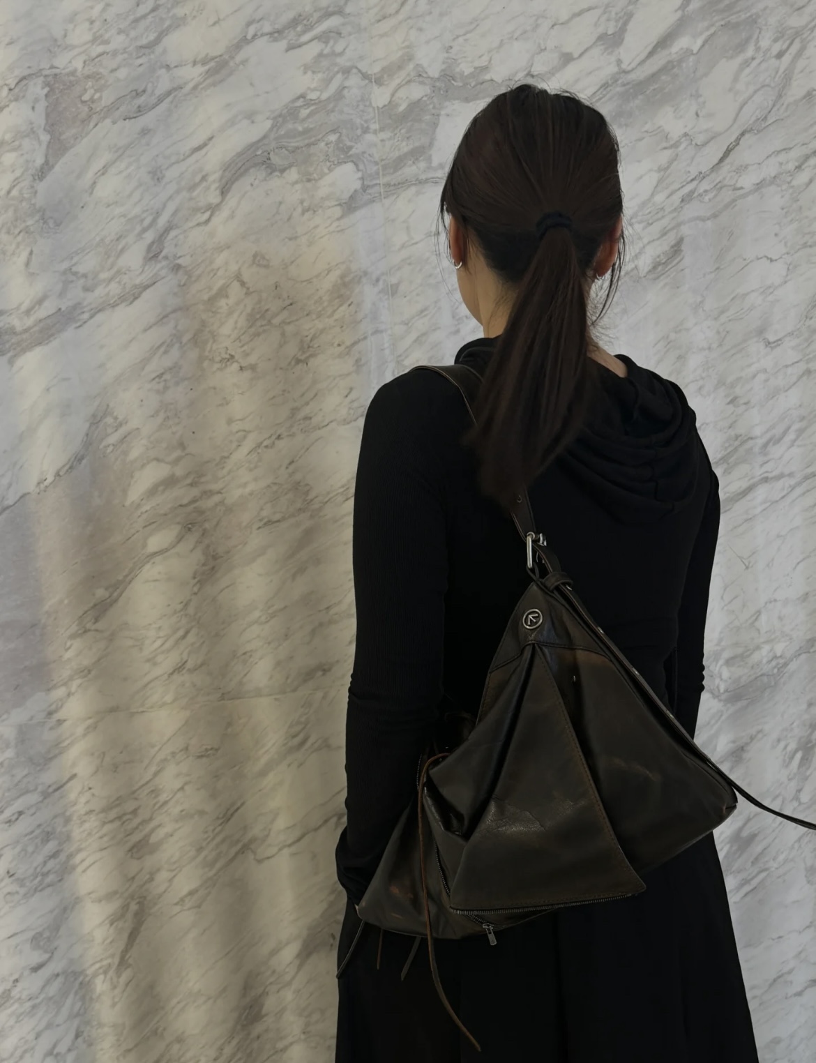 GROTTO, the contemporary designer label, presents its signature Hobo bag - Comprehensive 4