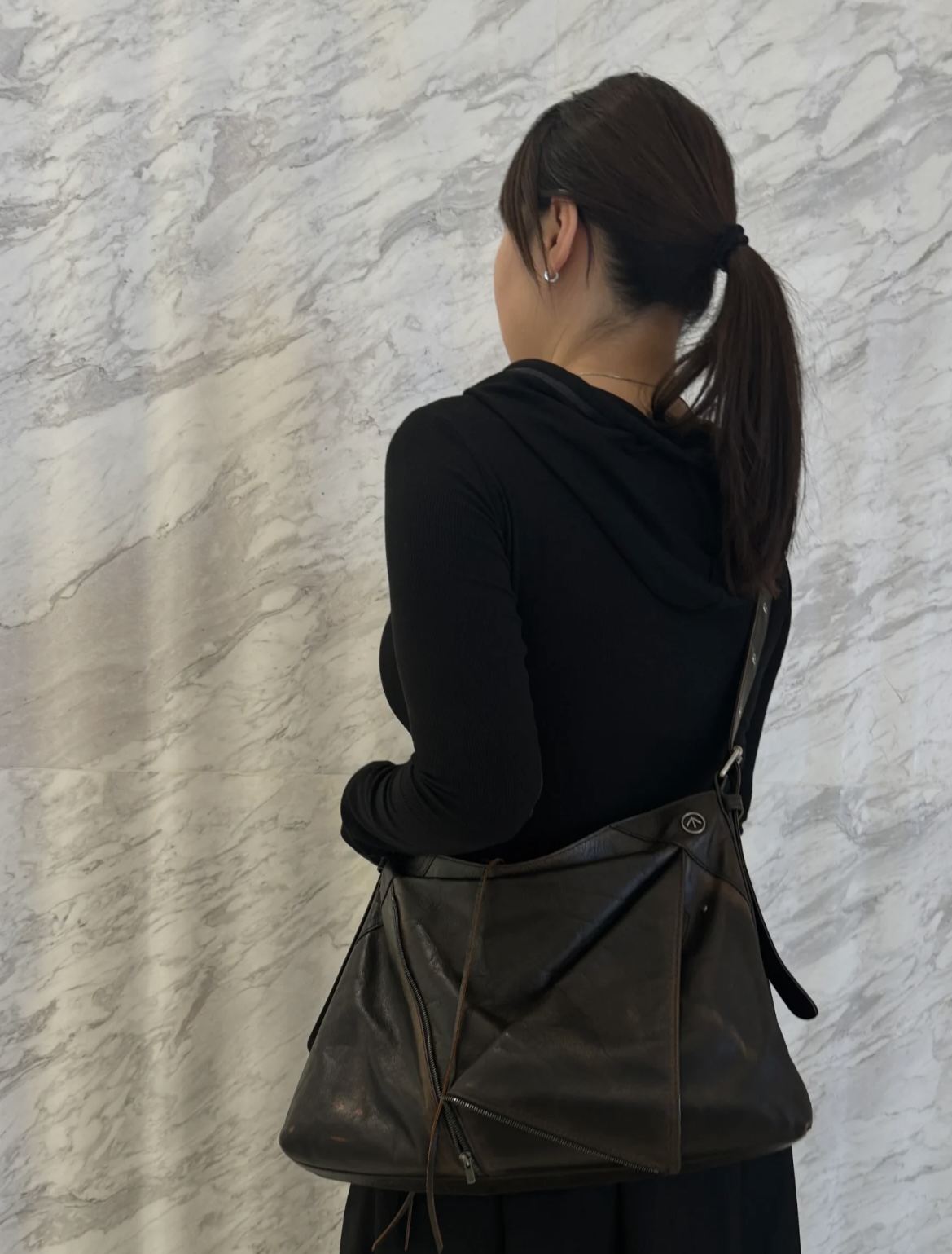 GROTTO, the contemporary designer label, presents its signature Hobo bag - Comprehensive 5