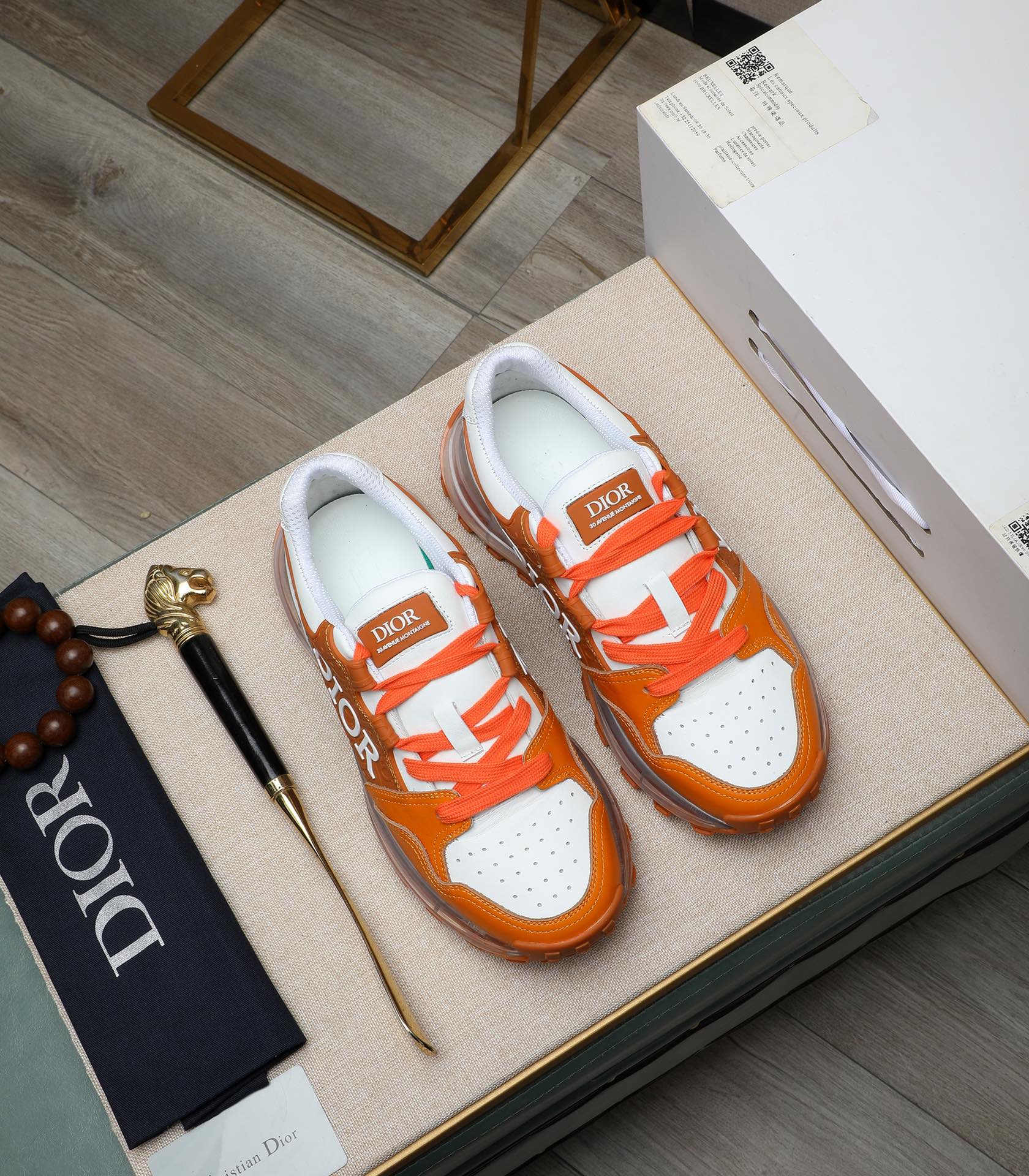 Dior Men's Orange Leather and Mesh Sneakers with Clear Sole 5 i1710177632 5849 2