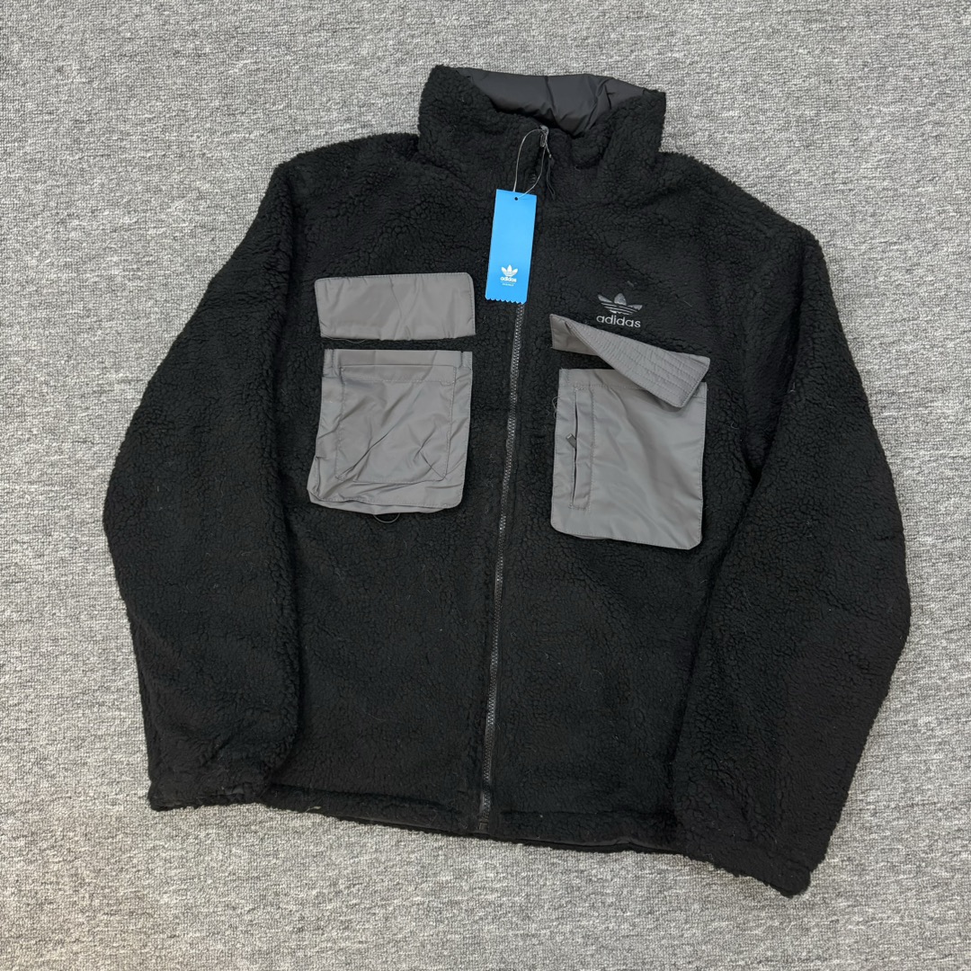 Adidas Zenium Collection: Quality Craftsmanship, Functional Details, Warmth, Large Pockets.