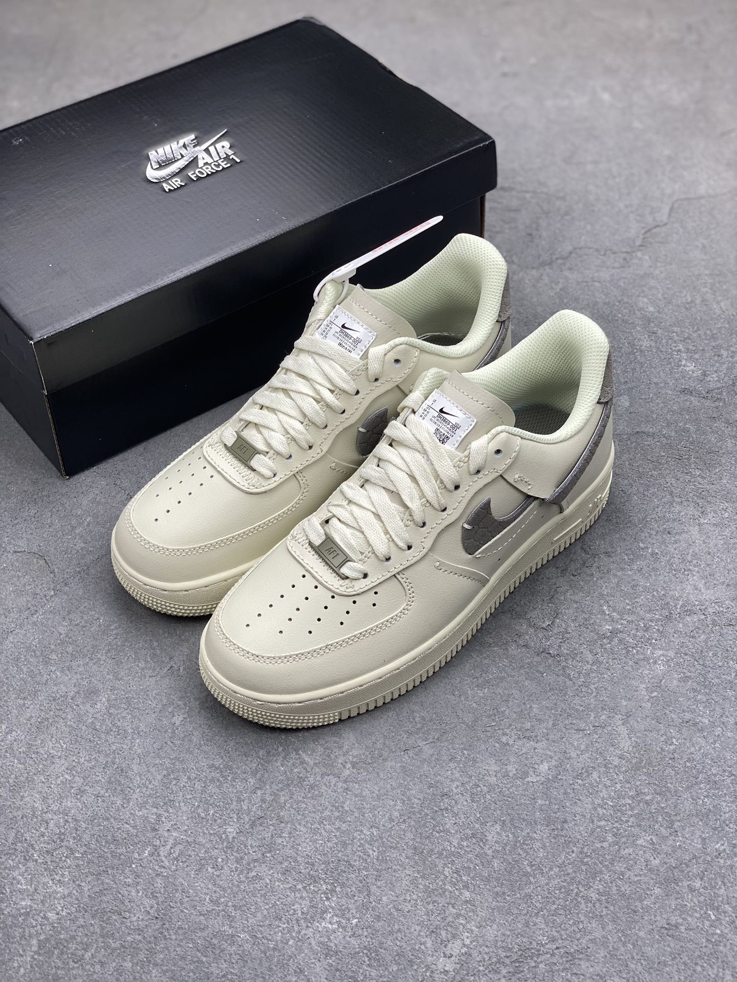 Nike Air Force 1 Low Cut-Out Swoosh Ivory Sneakers DH3869-001 9 i1697675112 4741 7