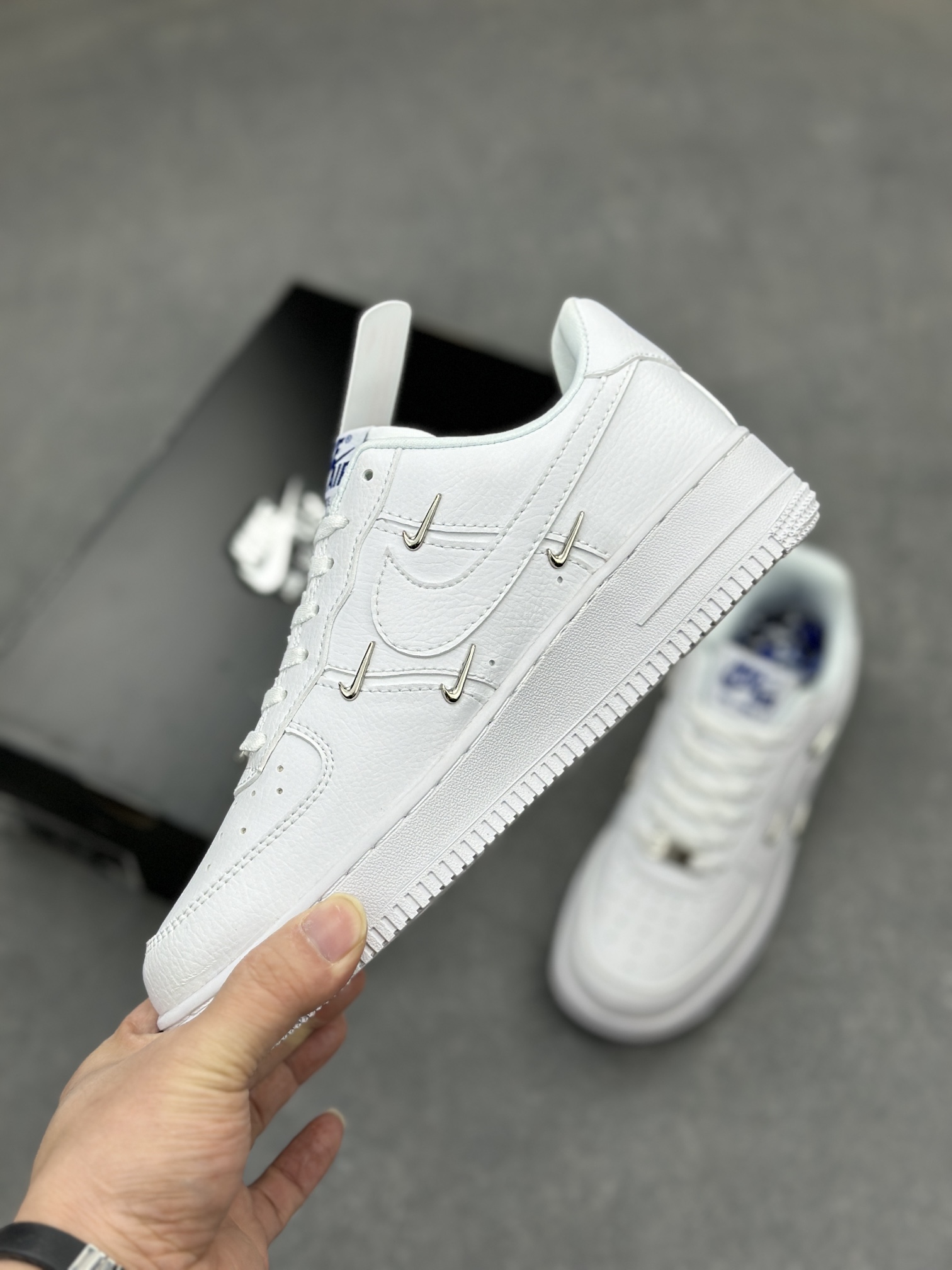 Nike Air Force 1 Low: Classic White Sneakers with Unique Pin Detailing and Comfort 4 i1710785663 6430 2