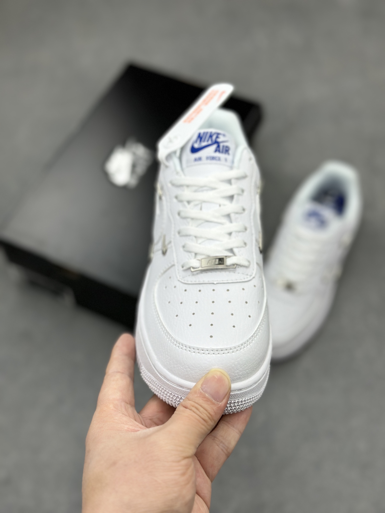 Nike Air Force 1 Low: Classic White Sneakers with Unique Pin Detailing and Comfort 3 i1710785663 8101 3