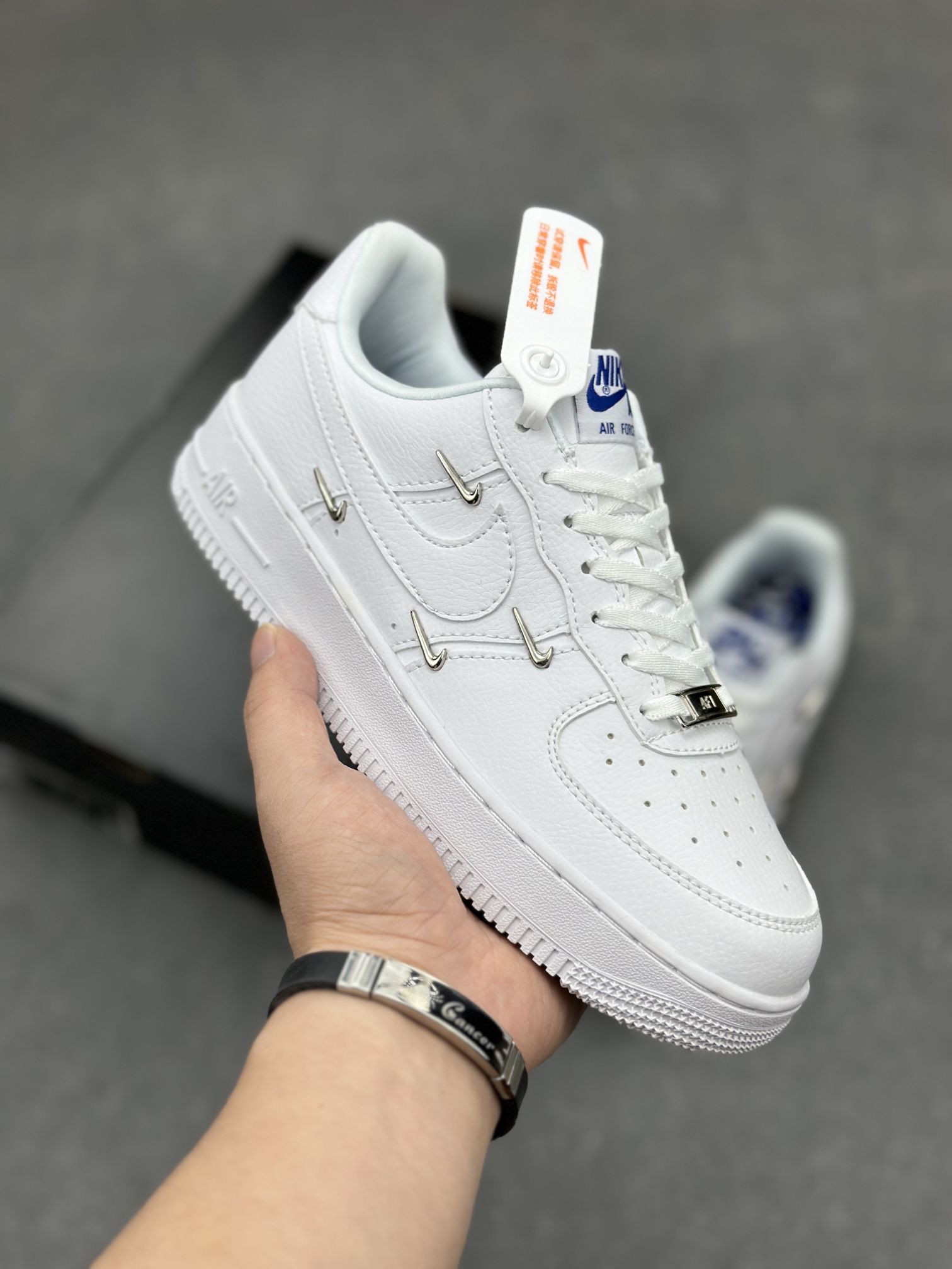 Nike Air Force 1 Low: Classic White Sneakers with Unique Pin Detailing and Comfort 2 i1710785663 869 1