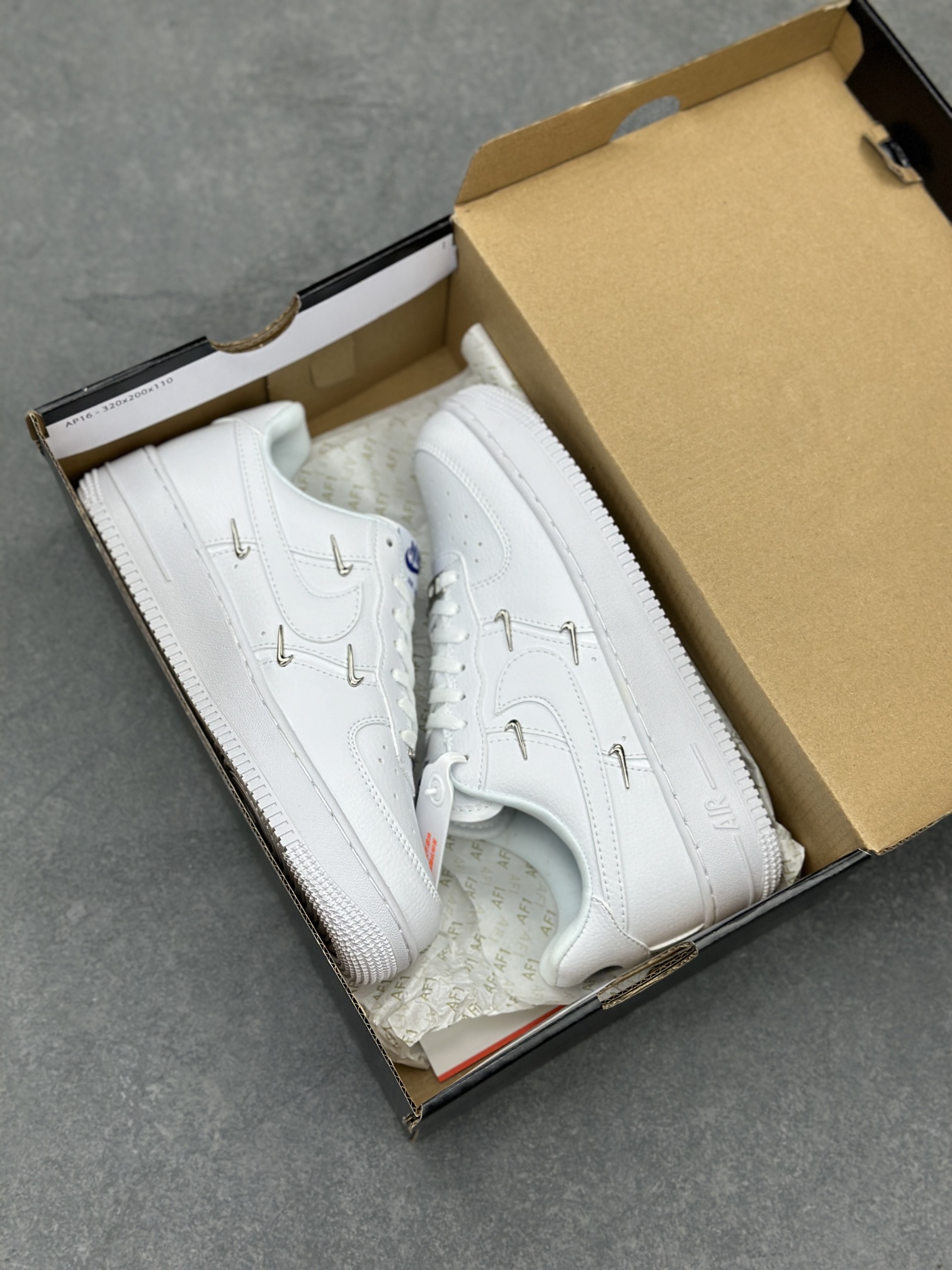 Nike Air Force 1 Low: Classic White Sneakers with Unique Pin Detailing and Comfort 10 i1710785664 5429 7