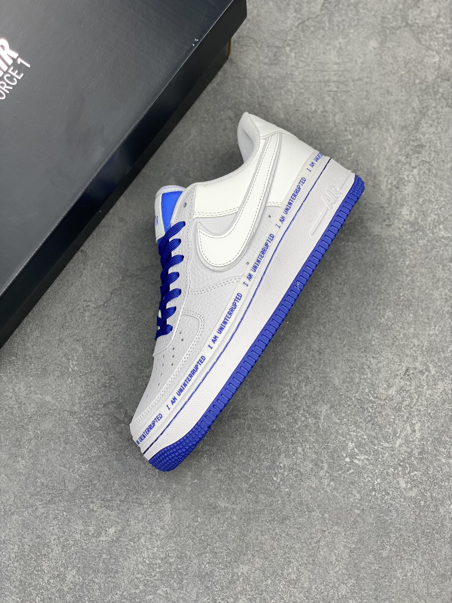 Nike Air Force 1 Uninterrupted: White/Blue Graffiti Sneakers 8 i1711306364 1484 0