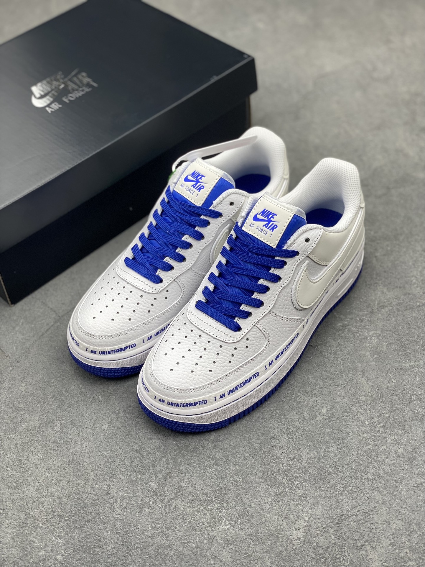 Nike Air Force 1 Uninterrupted: White/Blue Graffiti Sneakers 9 i1711306364 9568 0