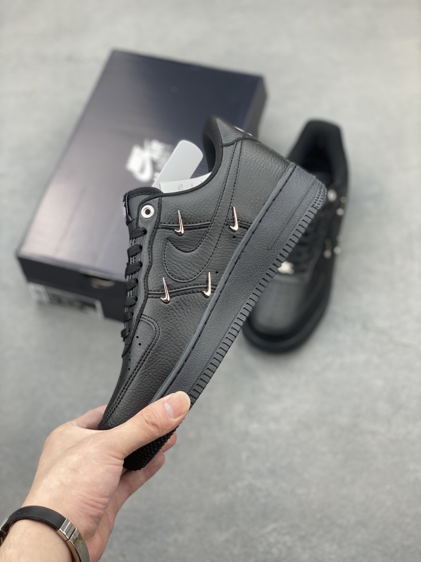 Nike Air Force 1 Black Leather Sneakers with Unique Hook Detailing 4 i1750104238250 650 0 2