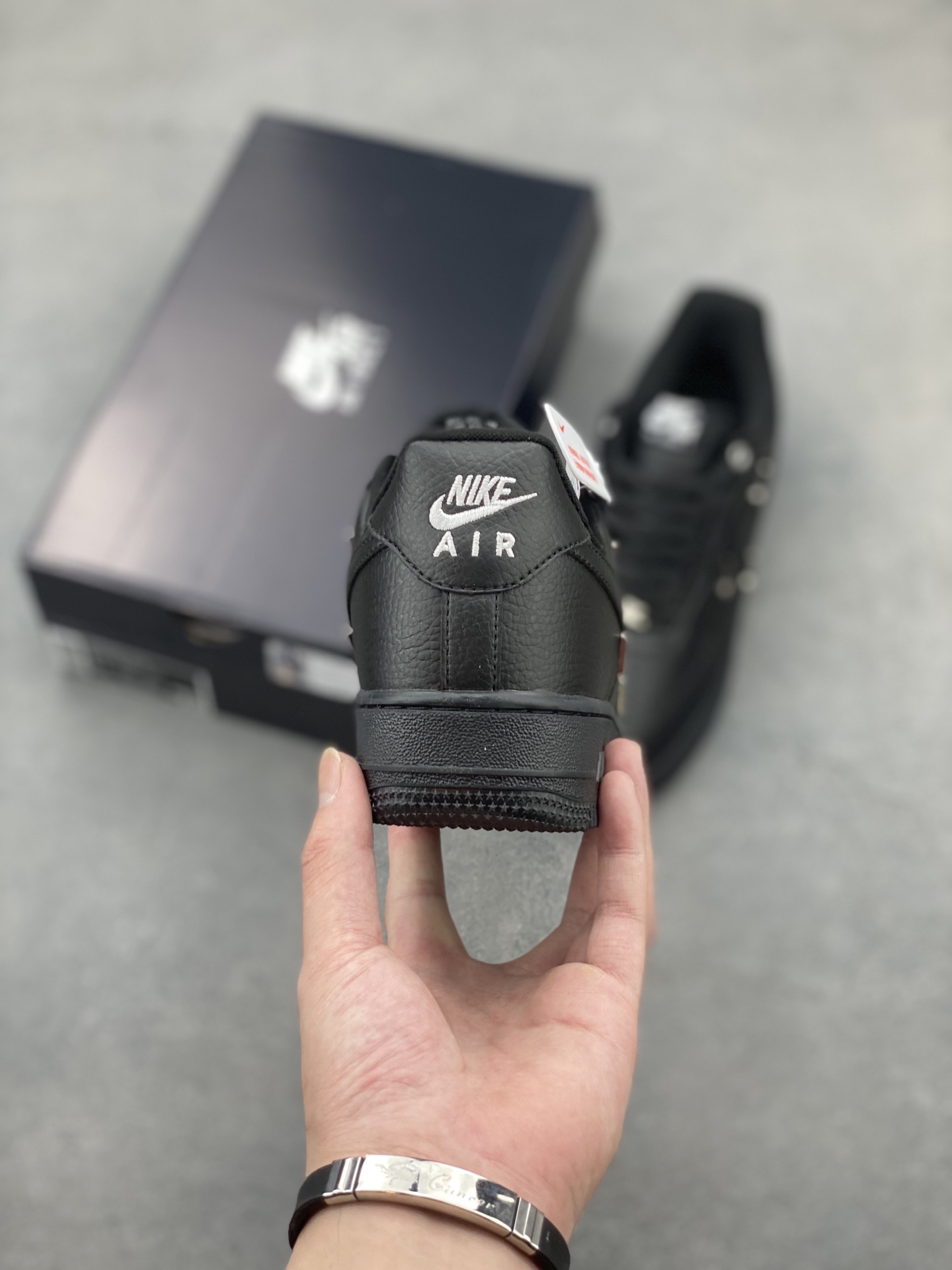 Nike Air Force 1 Black Leather Sneakers with Unique Hook Detailing 5 i1750104239714 5196 0 3