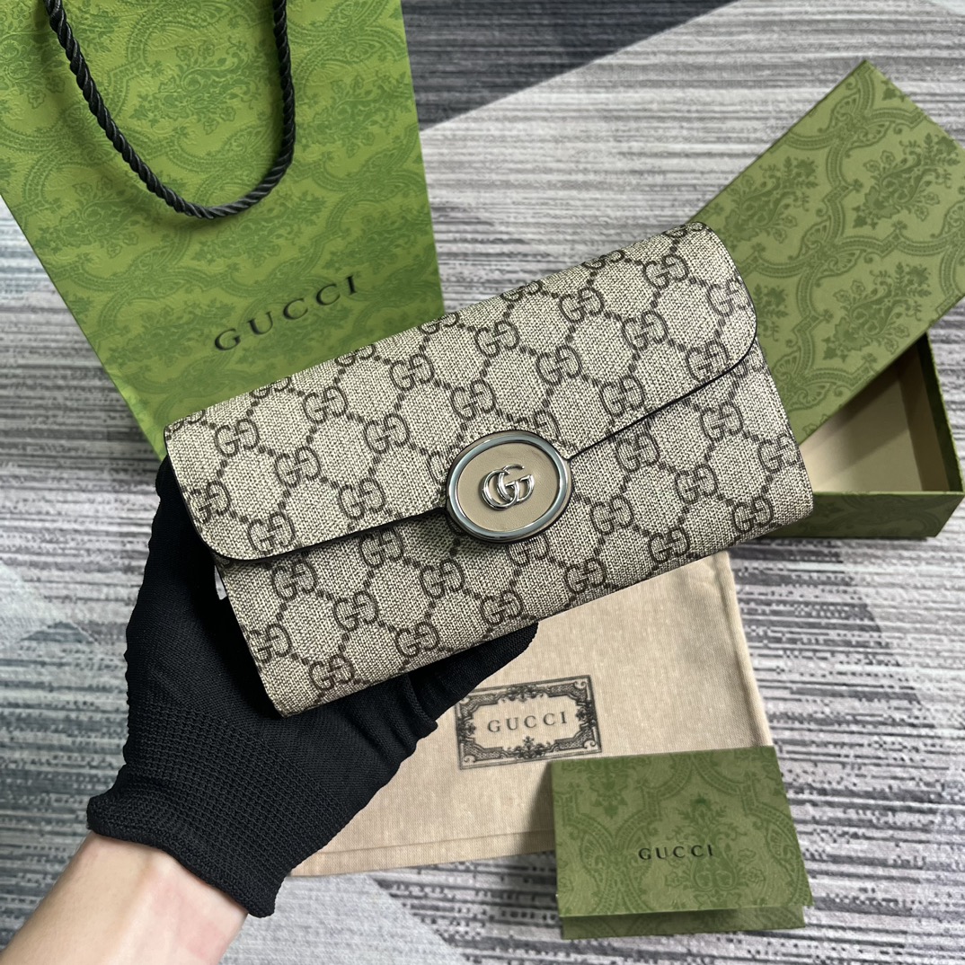 GG Supreme canvas long wallet with Double G detail and snap closure