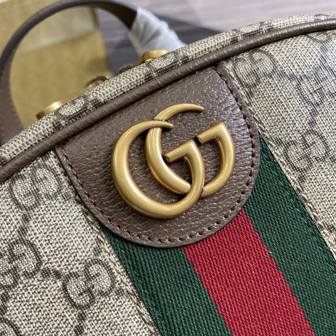 [Backpacks]Brown leather piping Gold tone accessories Red and green stripe web