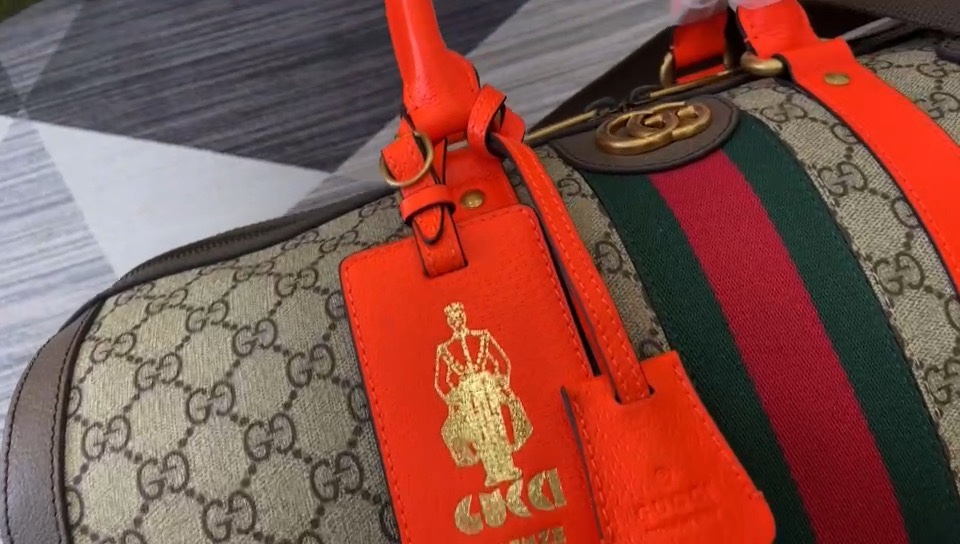 Diseñador falso
 Gucci Bolsos de viaje