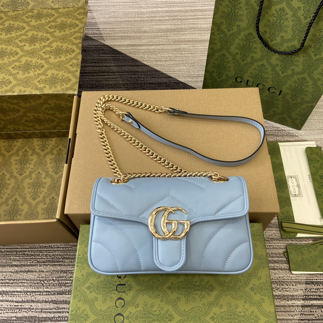 GUCCI GG Marmont серыя, малы наплечны заплечнік, сцёганая V-падобная скура, светла-блакітны, светла-залатая фурнітура, ланцужок з рэгуляваным рамяном, наплечны і ручны - вышэйшая якасць