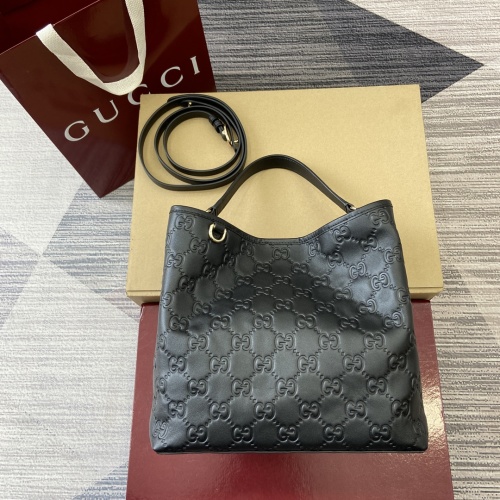 Gucci Emblem Black Embossed Leather Bucket Bag with Adjustable Strap 1 Gucci Emblem Black Embossed Leather Bucket Bag with Adjustable Strap