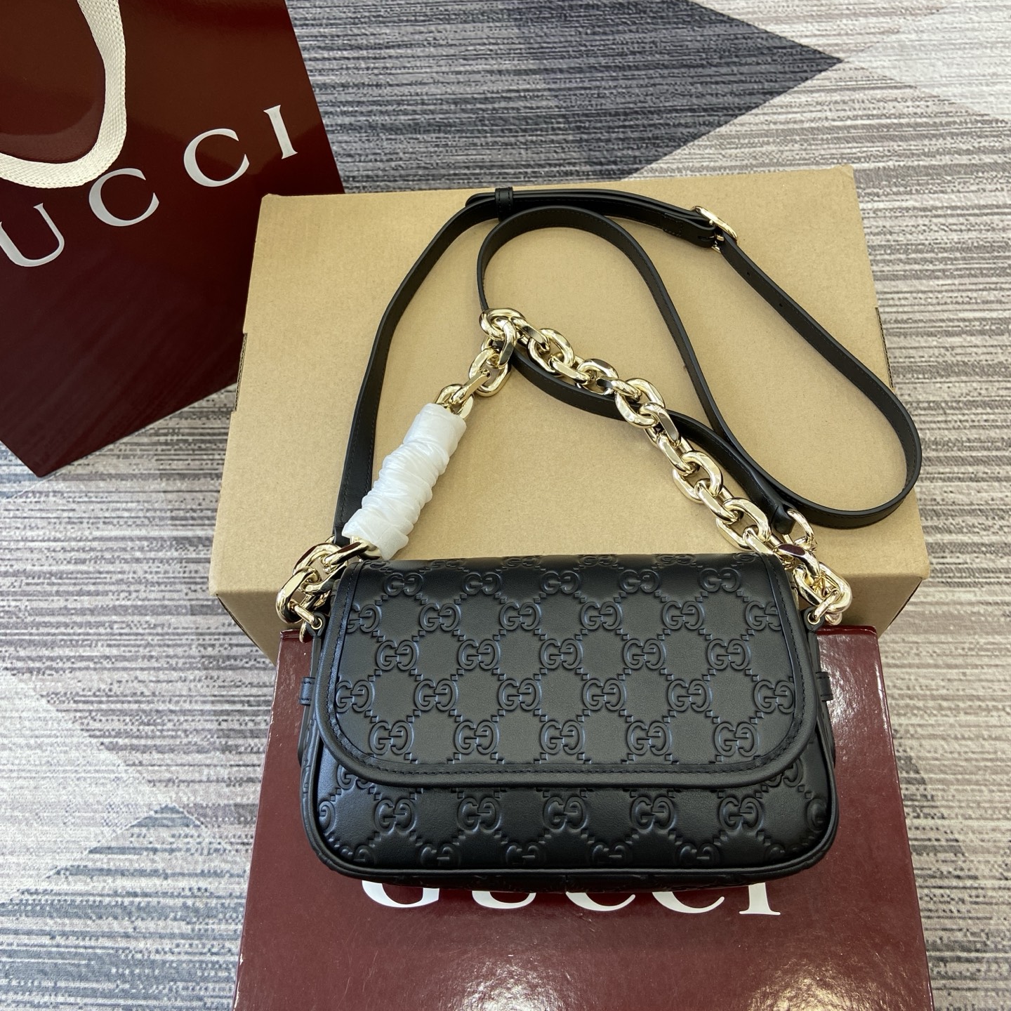 Gucci Emblem Black Embossed Leather Shoulder Bag with Chain Strap 2 i1753426779205 8893 0 0