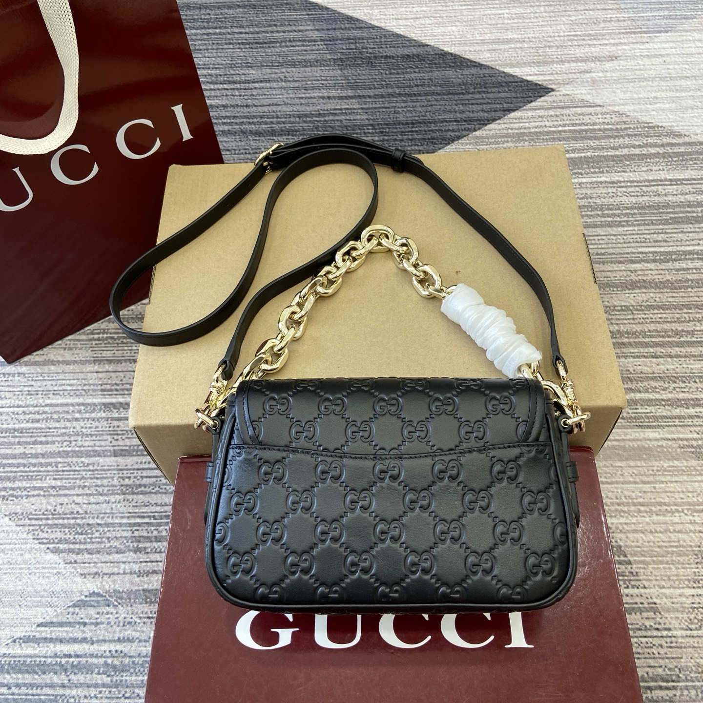 Gucci Emblem Black Embossed Leather Shoulder Bag with Chain Strap 3 i1753426782371 275 0 1