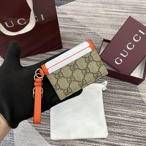 Gucci Emblem Card Holder Beige and Dark Brown with Orange Leather Trim 1 Gucci Emblem Card Holder Beige and Dark Brown with Orange Leather Trim