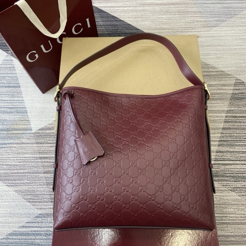 Gucci Emblem Rosso Ancora Embossed Leather Bucket Bag - Elegant & Functional 1 Gucci Emblem Rosso Ancora Embossed Leather Bucket Bag - Elegant & Functional