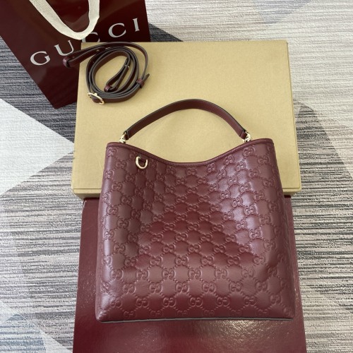 Gucci Emblem Embossed Leather Bucket Bag Purse with Adjustable Strap 1 Gucci Emblem Embossed Leather Bucket Bag Purse with Adjustable Strap