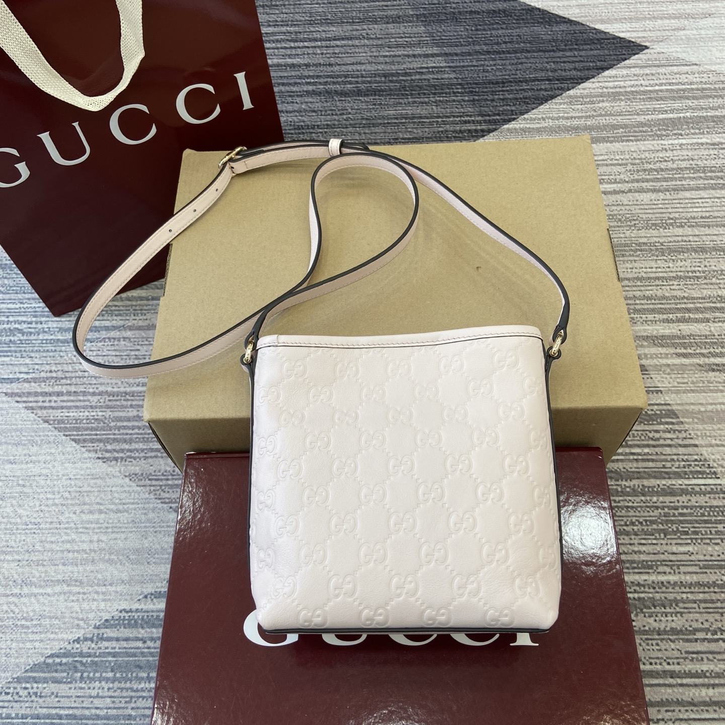 Gucci Emblem Mini Bucket Bag Light Pink Gucci Print Embossed Leather 3 i1756271398715 1599 0 1