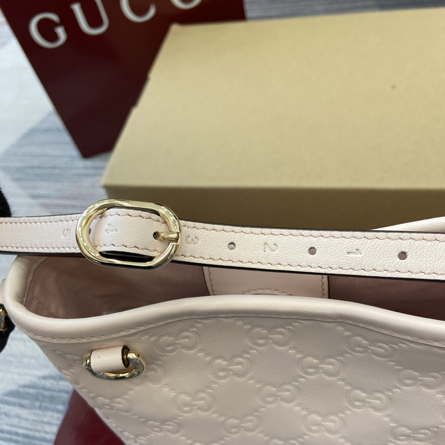 Gucci Emblem Mini Bucket Bag Light Pink Gucci Print Embossed Leather 8 i1756271398952 9539 0 7